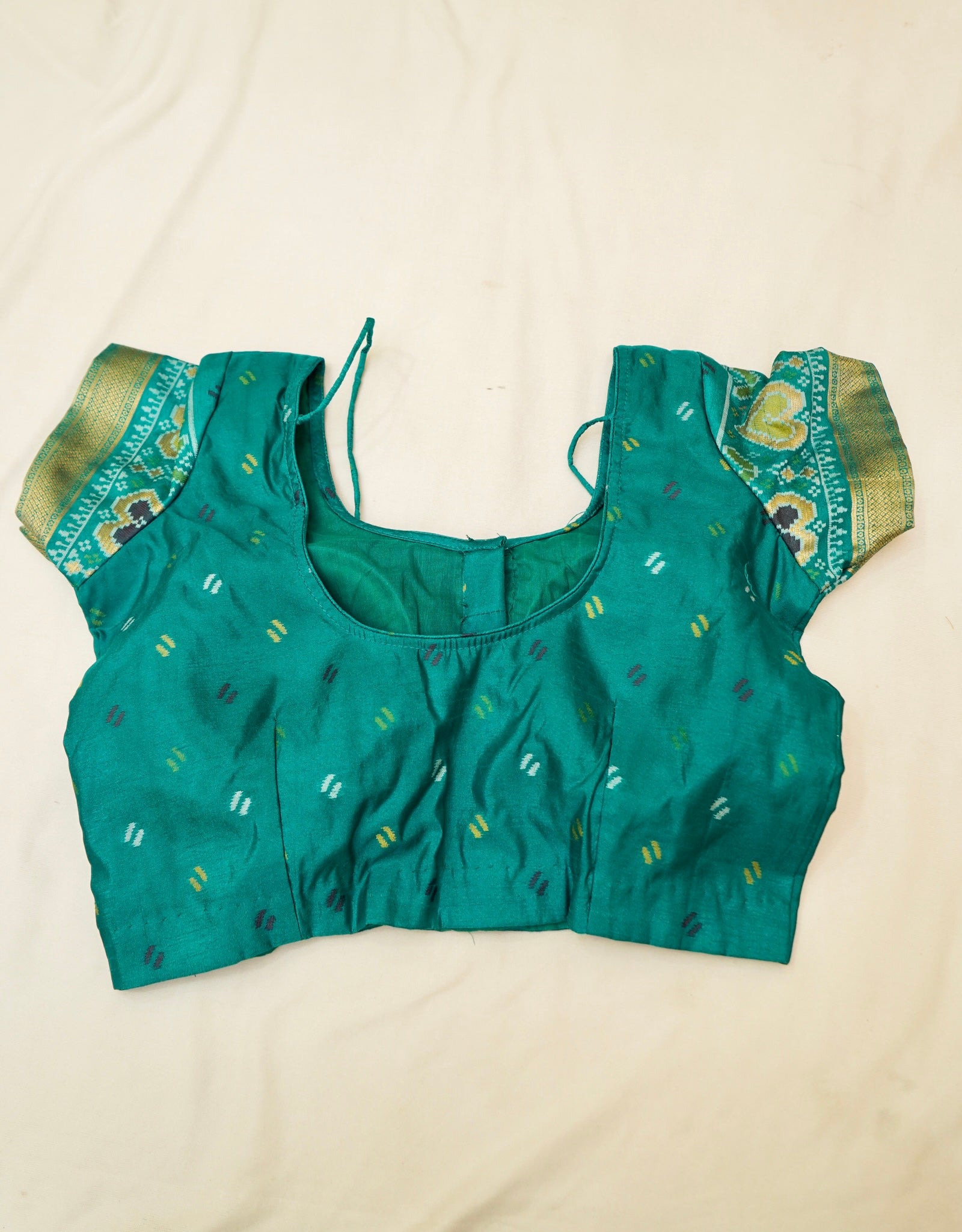 Mustard Yellow Ikkat Patola Silk Saree with Teal Border and Stitched Blouse