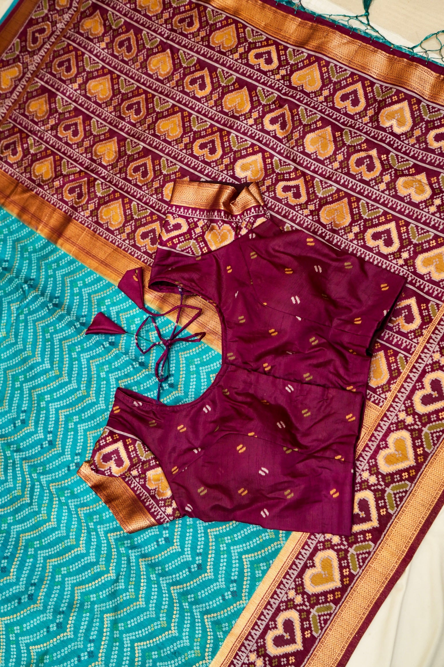 Turquoise Blue Ikkat Patola Silk Saree with Wine Border and Stitched Blouse