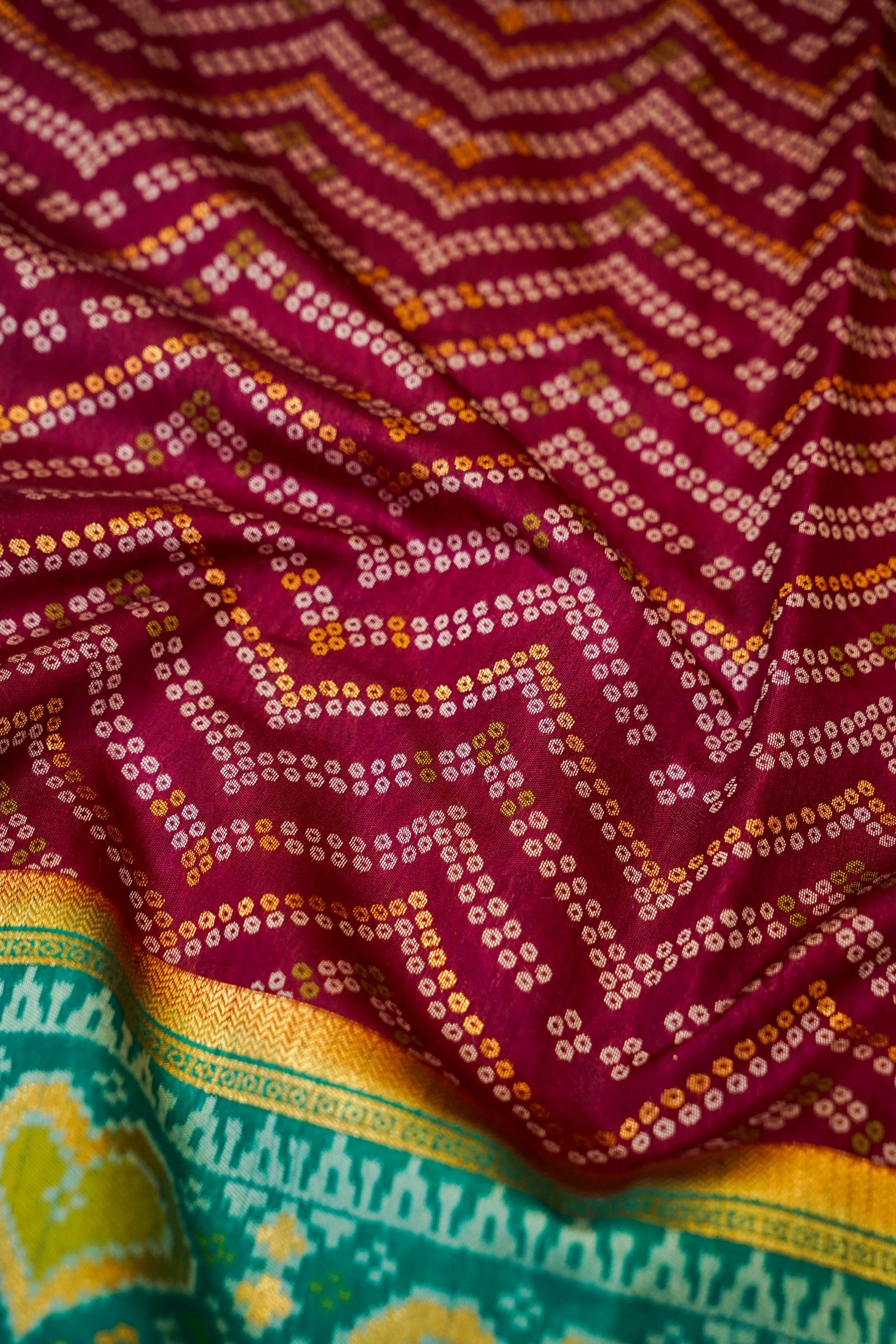 Wine Ikkat Patola Silk Saree with Teal Border and Stitched Blouse