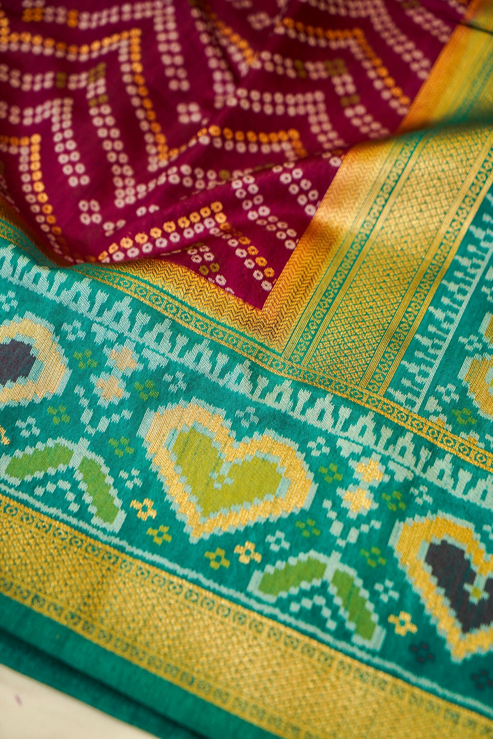 Wine Ikkat Patola Silk Saree with Teal Border and Stitched Blouse