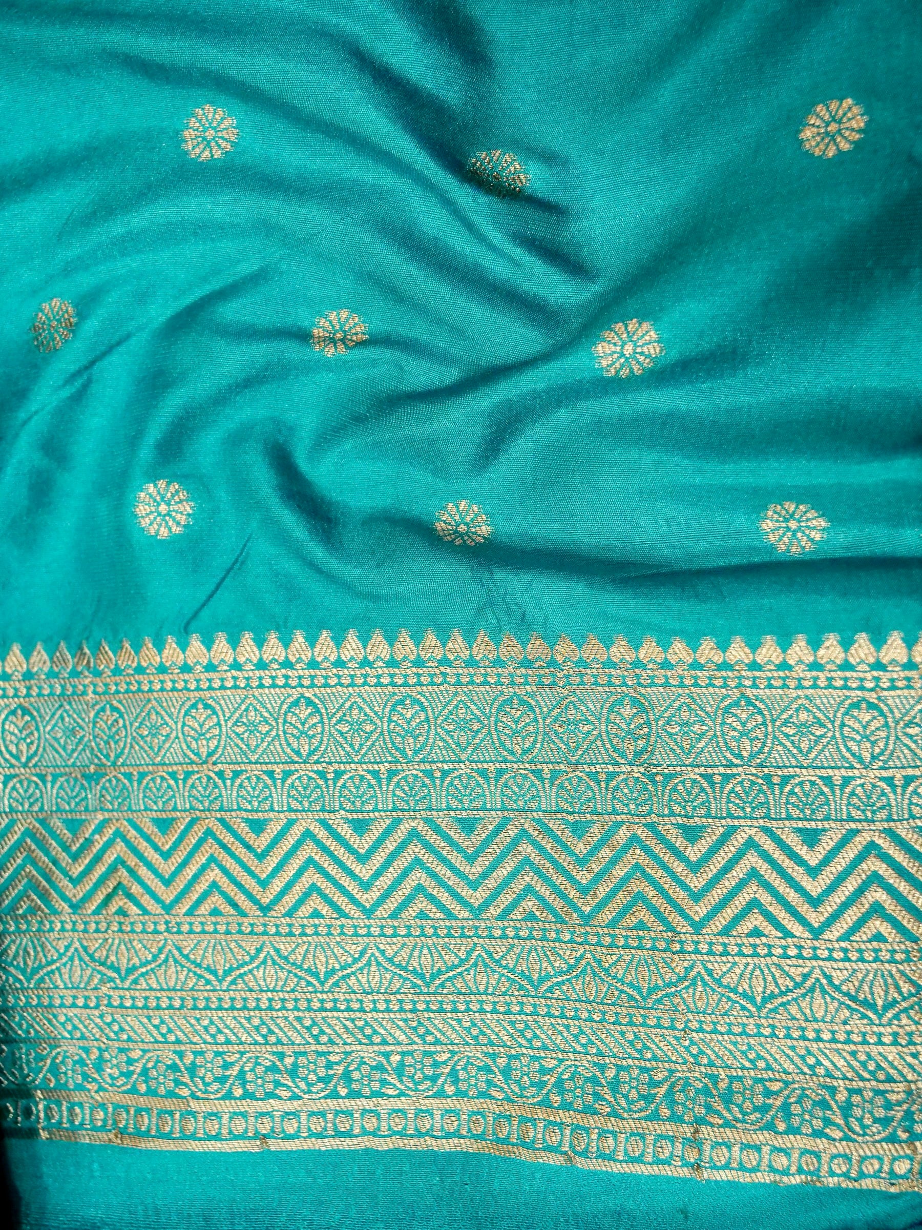Teal Crepe Georgette Silk Saree with Gold Zari