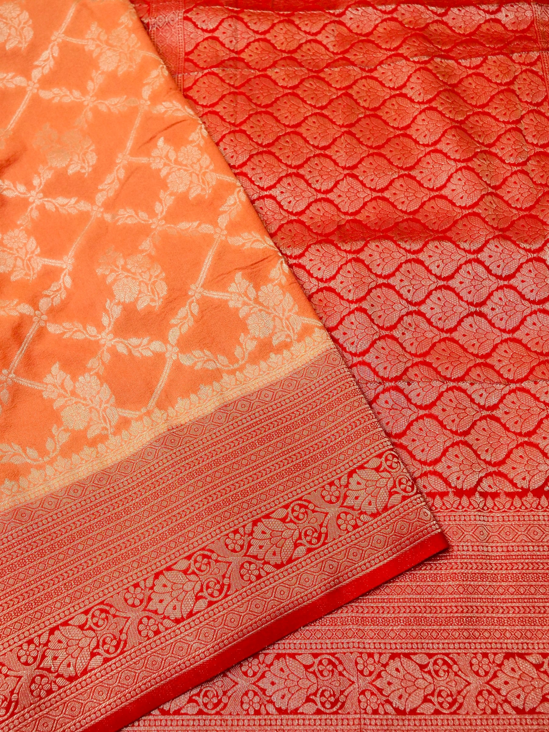 Pastel Orange Crepe Georgette Silk Saree with Red Border