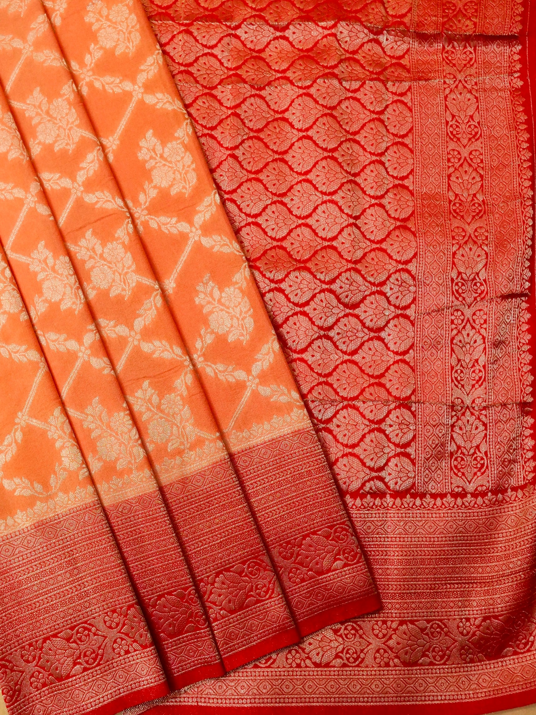 Pastel Orange Crepe Georgette Silk Saree with Red Border