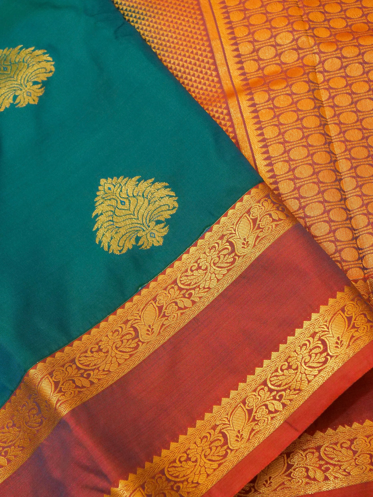 Devi - Peacock Teal Blue Kanjivaram Silk Saree with Korvai Border
