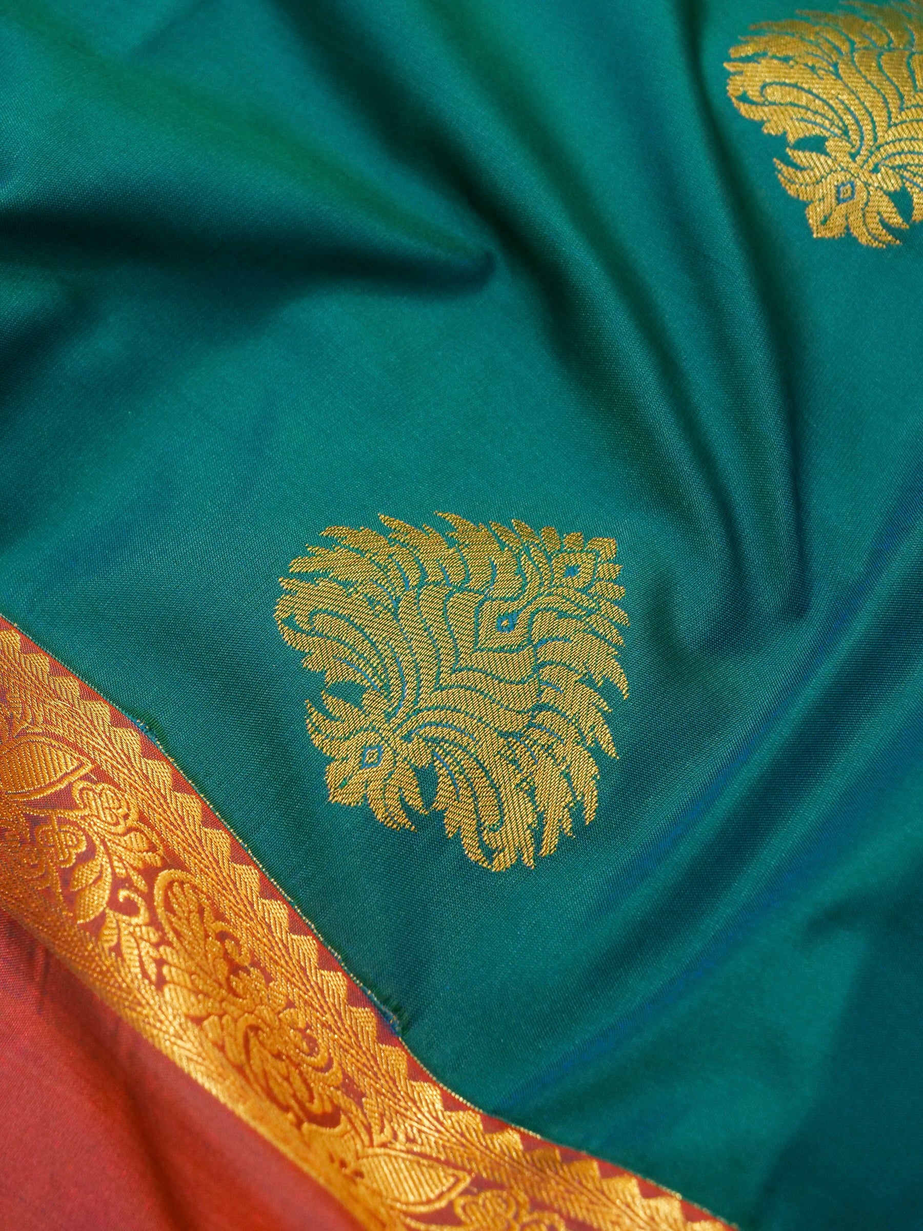 Devi - Peacock Teal Blue Kanjivaram Silk Saree with Korvai Border