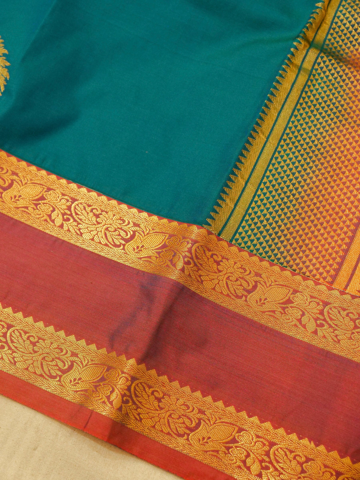 Devi - Peacock Teal Blue Kanjivaram Silk Saree with Korvai Border