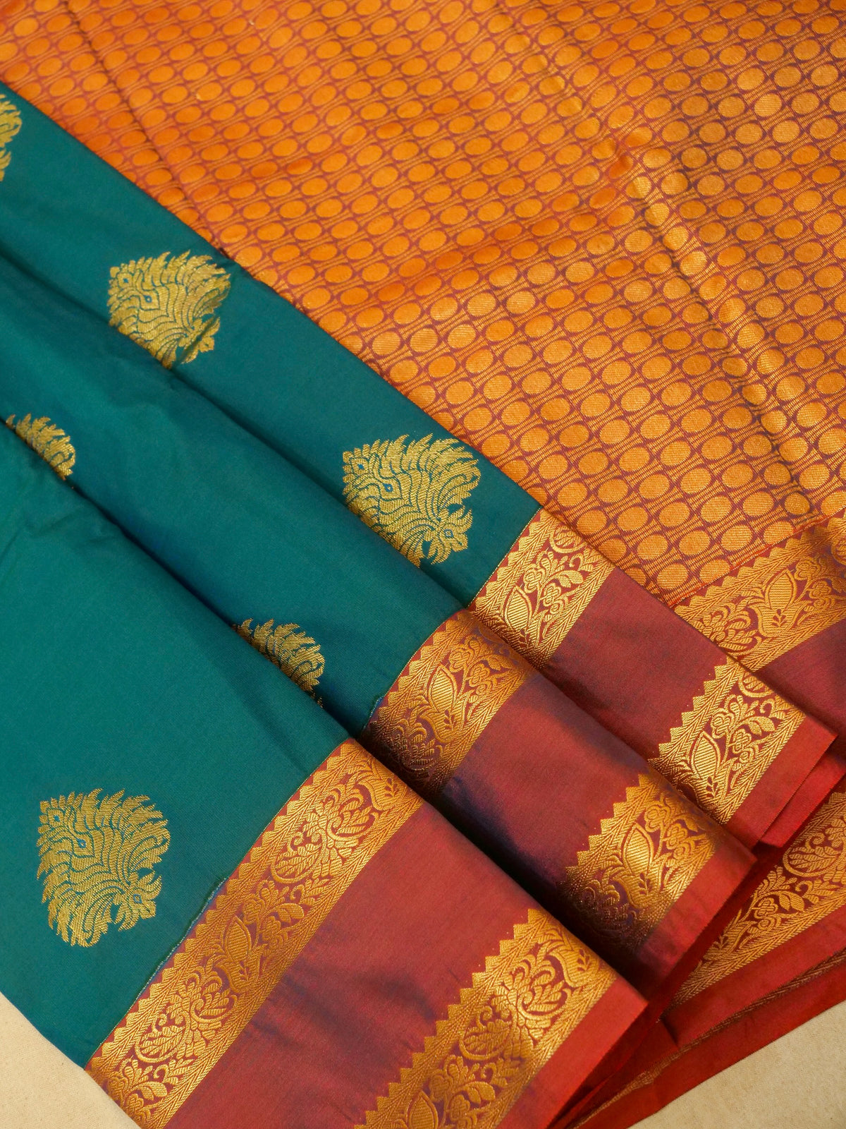 Devi - Peacock Teal Blue Kanjivaram Silk Saree with Korvai Border