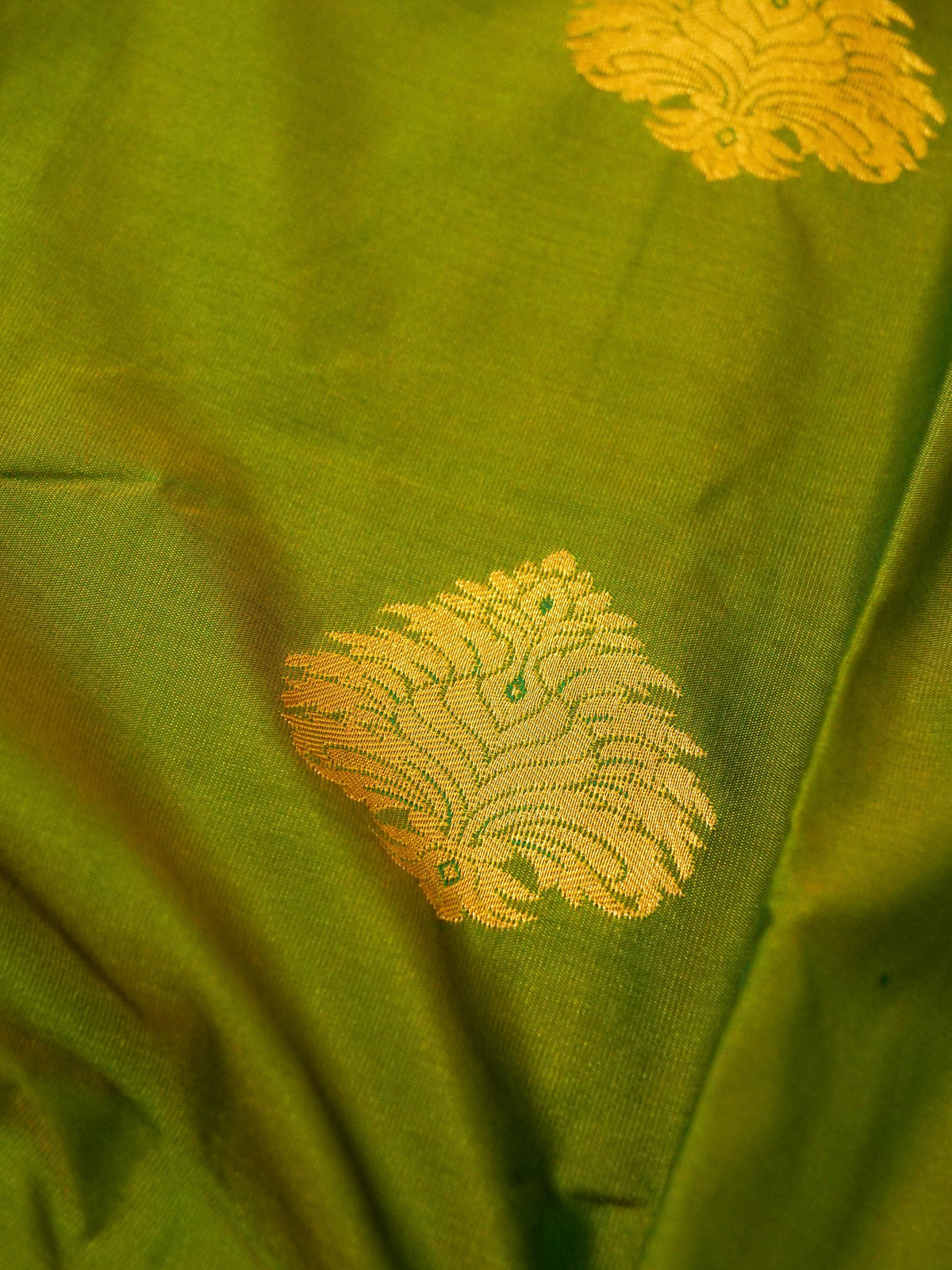 Devi - Parrot Green Kanjivaram Silk Saree with Korvai Border