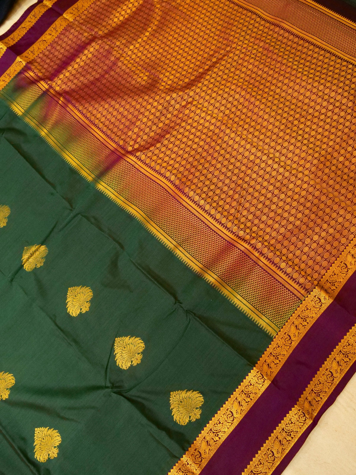 Devi - Forest Green Kanjivaram Silk Saree with Korvai Border