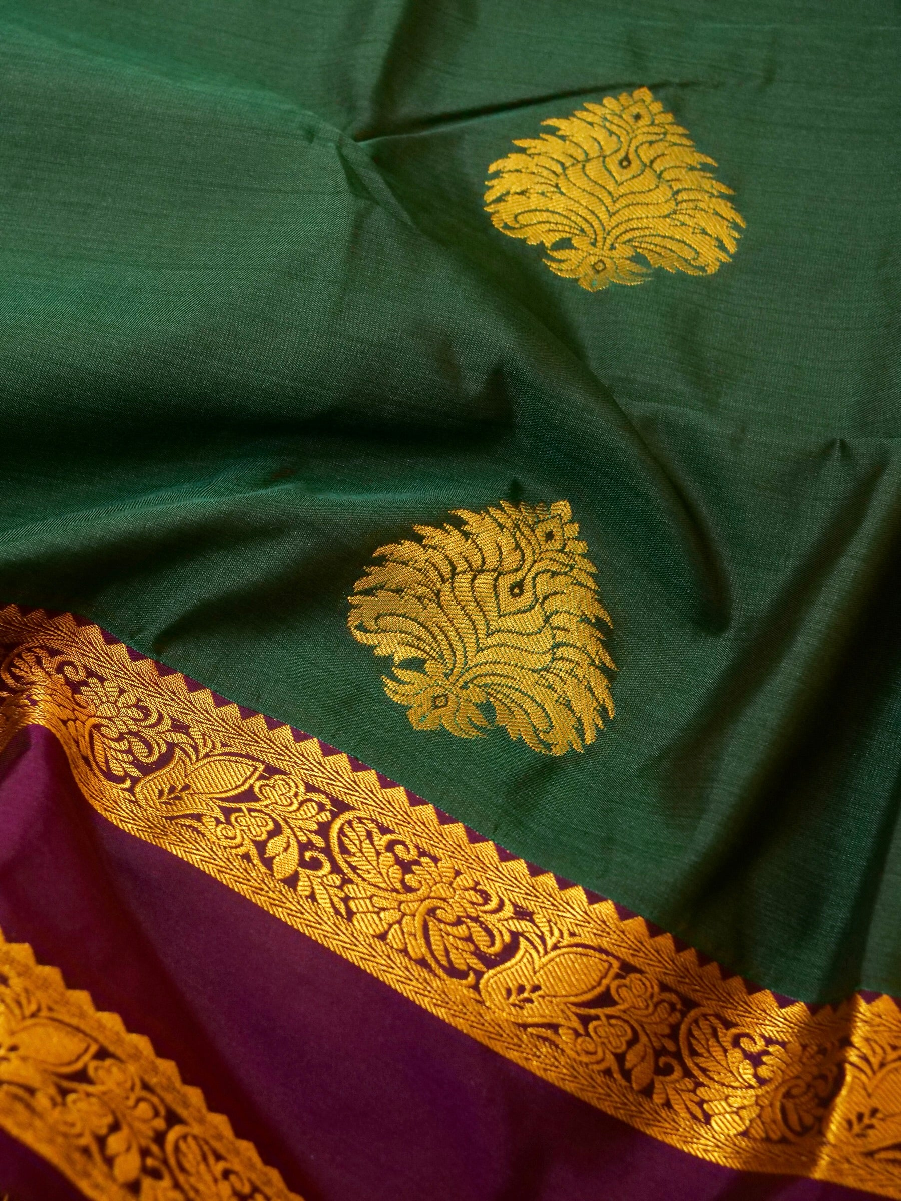 Devi - Forest Green Kanjivaram Silk Saree with Korvai Border