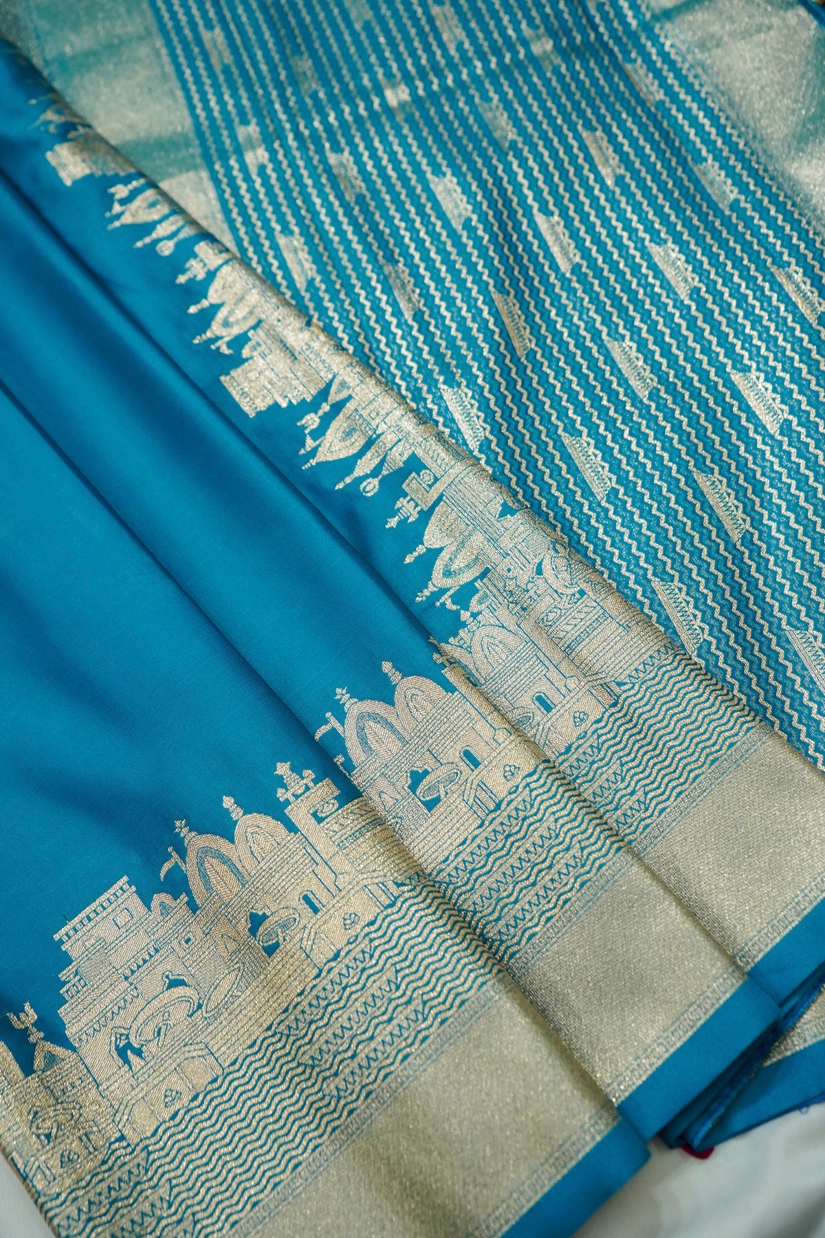 Rihar - Pastel Blue Ghat Border Banarasi Silk Saree with Stitched Blouse
