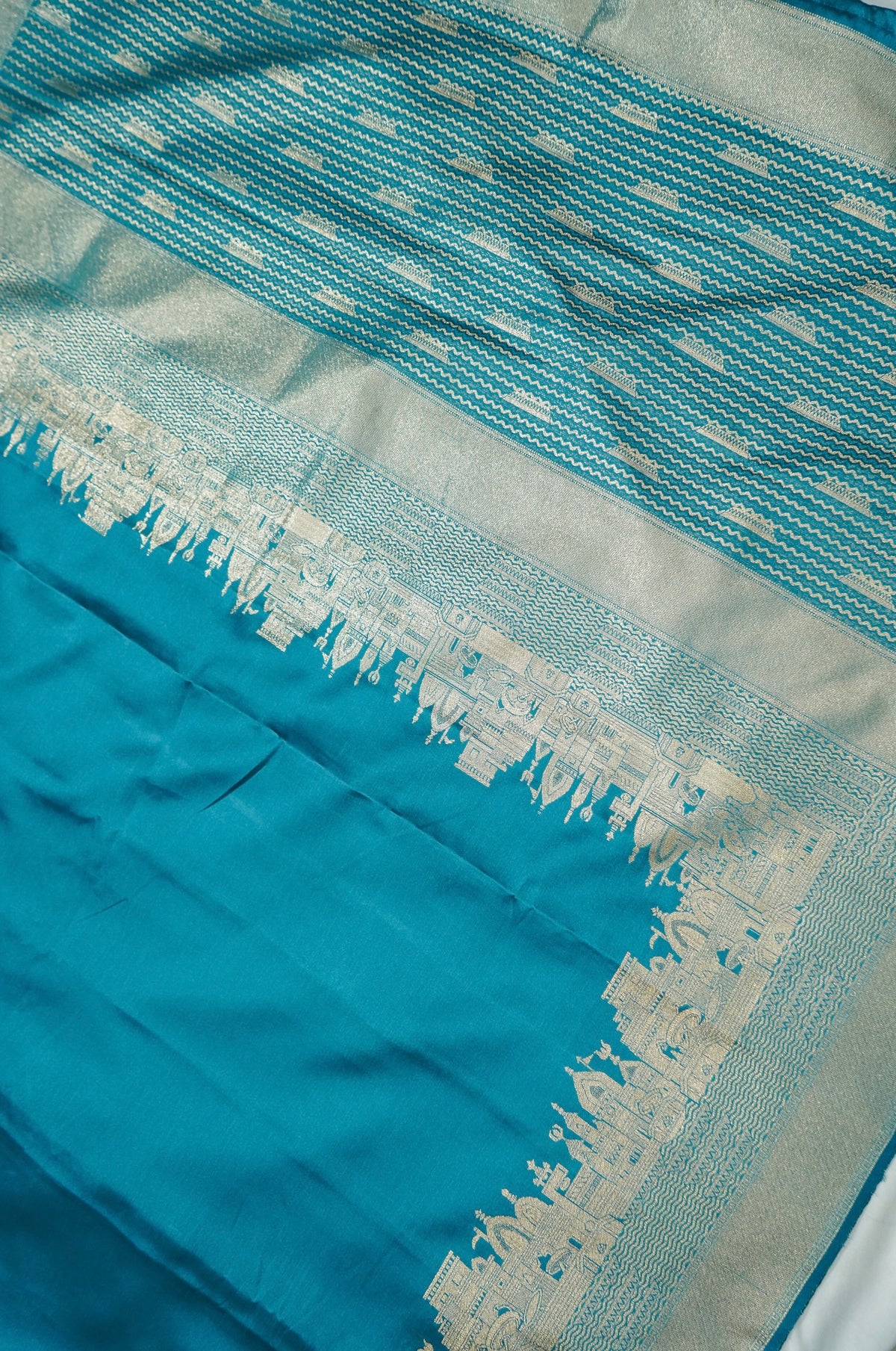 Rihar - Pastel Teal Ghat Border Banarasi Silk Saree with Stitched Blouse