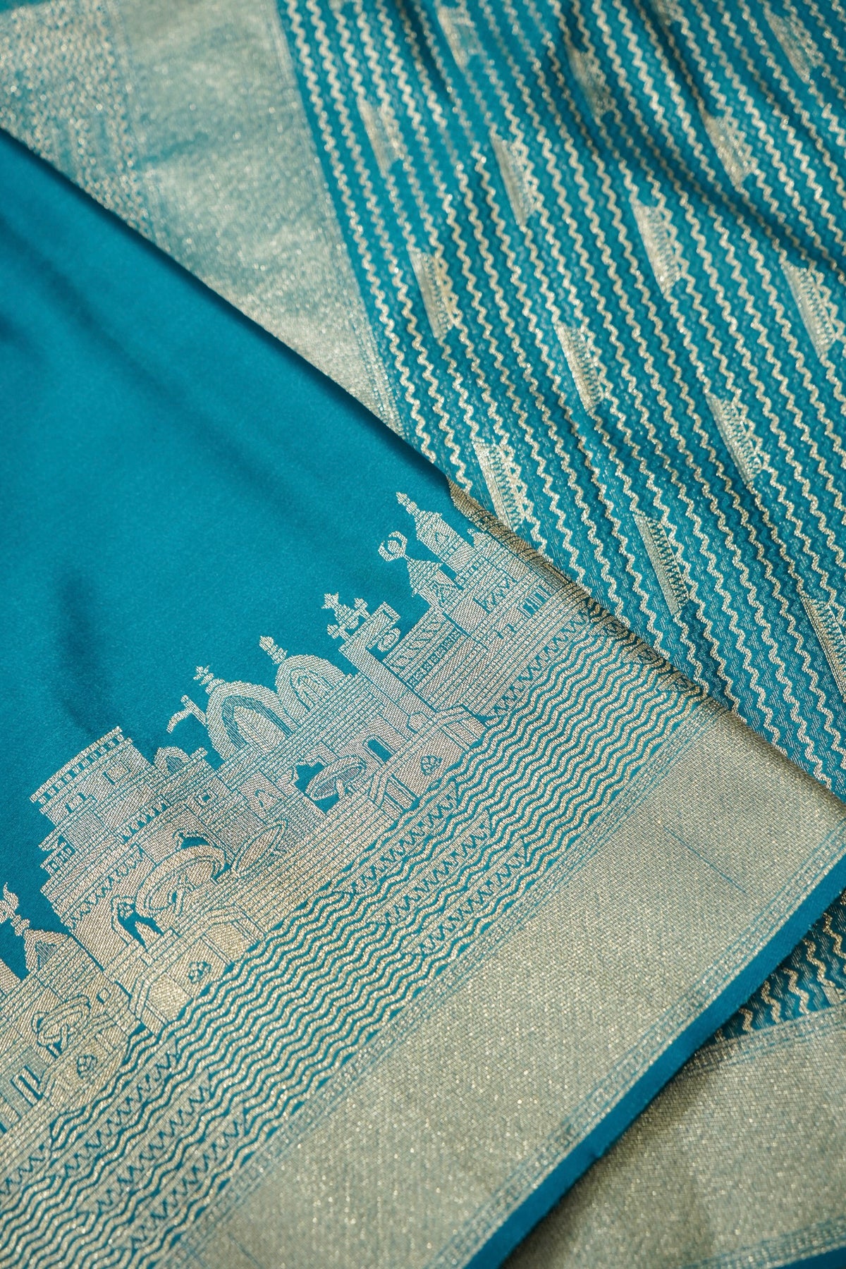 Rihar - Pastel Teal Ghat Border Banarasi Silk Saree with Stitched Blouse