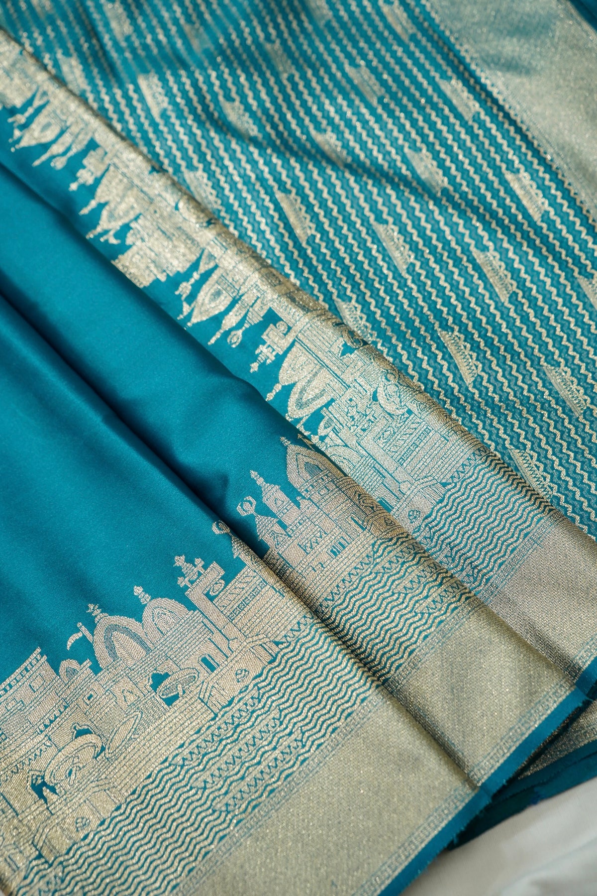 Rihar - Pastel Teal Ghat Border Banarasi Silk Saree with Stitched Blouse
