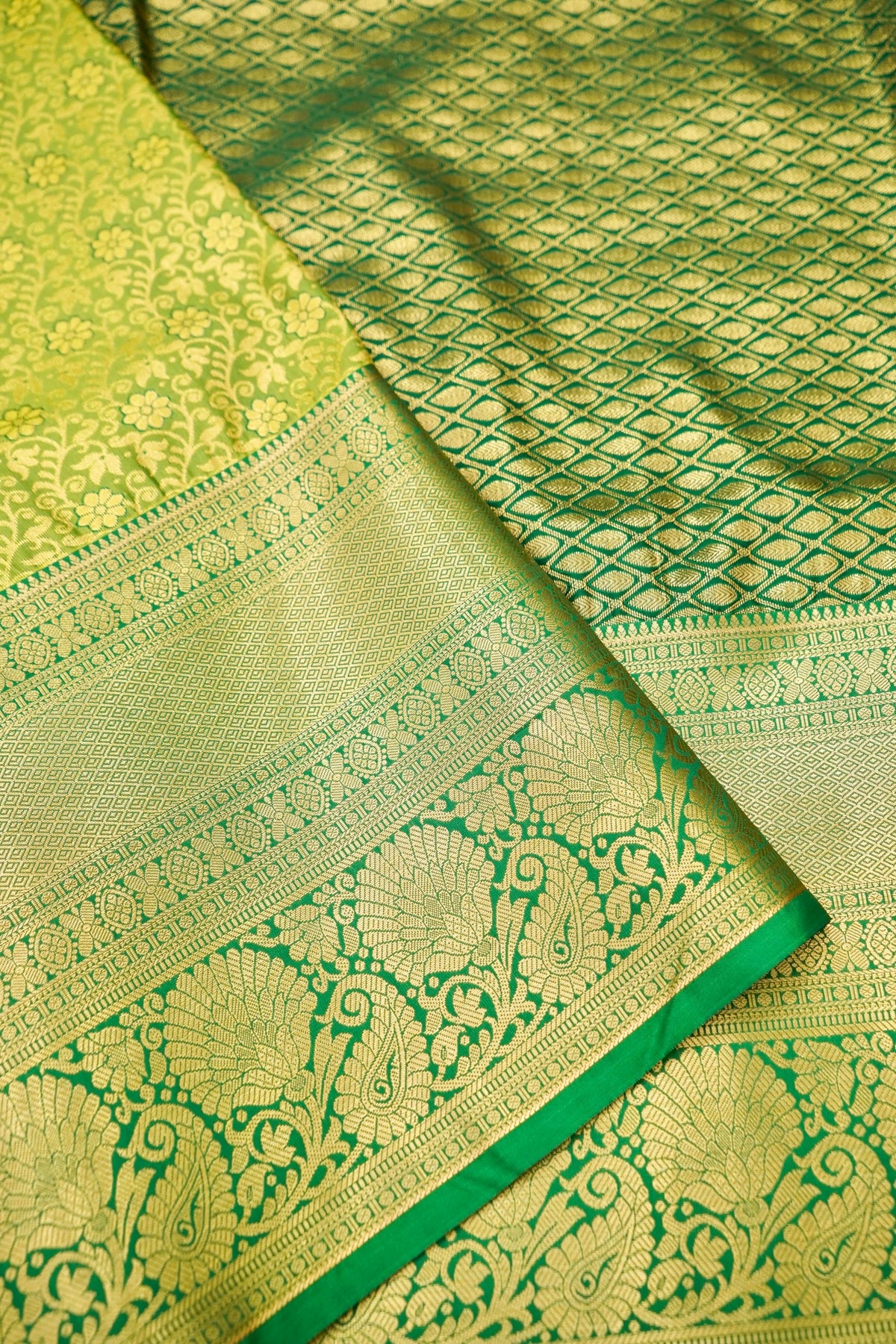 Devyani - Lime Green Kanchi Pattu Silk Saree with Emerald Green Border