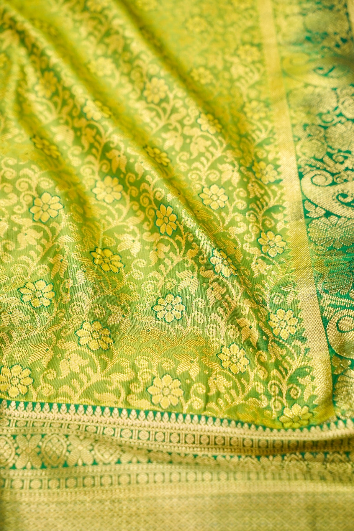 Devyani - Lime Green Kanchi Pattu Silk Saree with Emerald Green Border