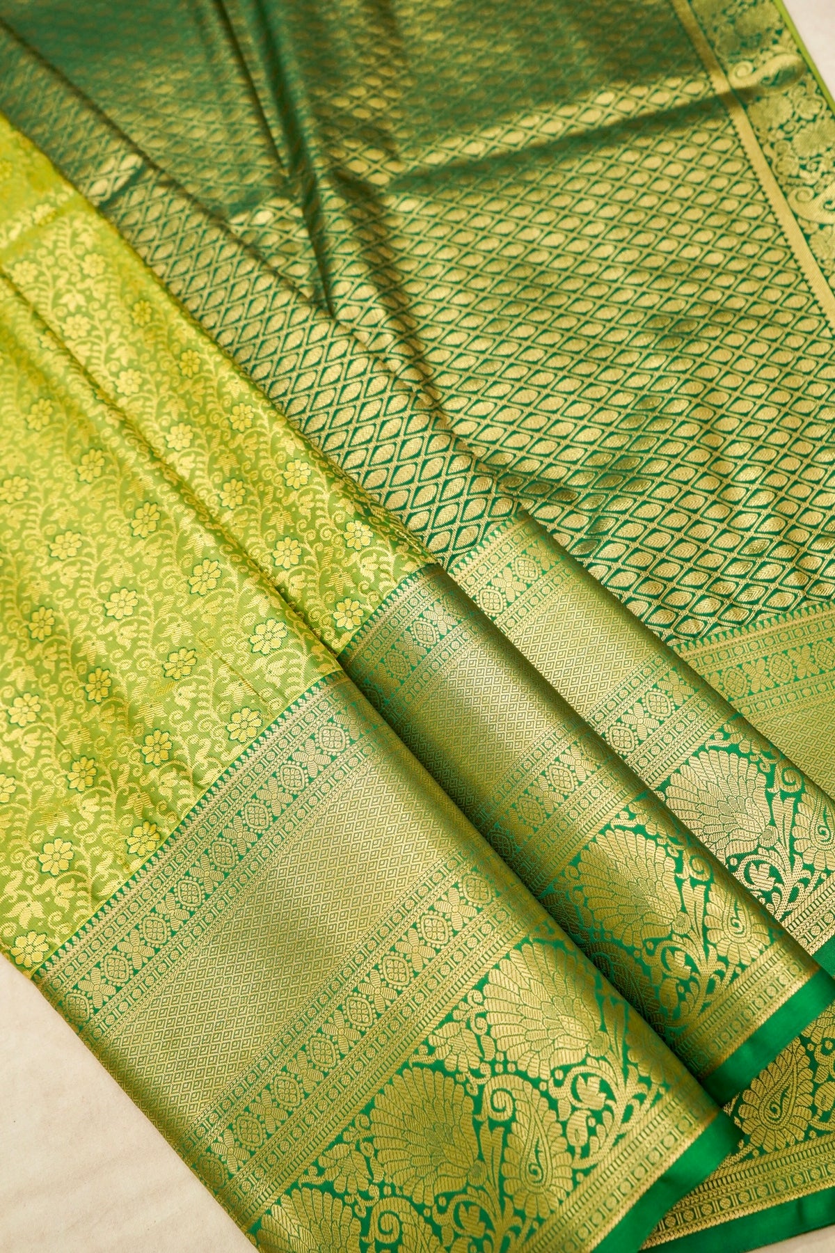 Devyani - Lime Green Kanchi Pattu Silk Saree with Emerald Green Border