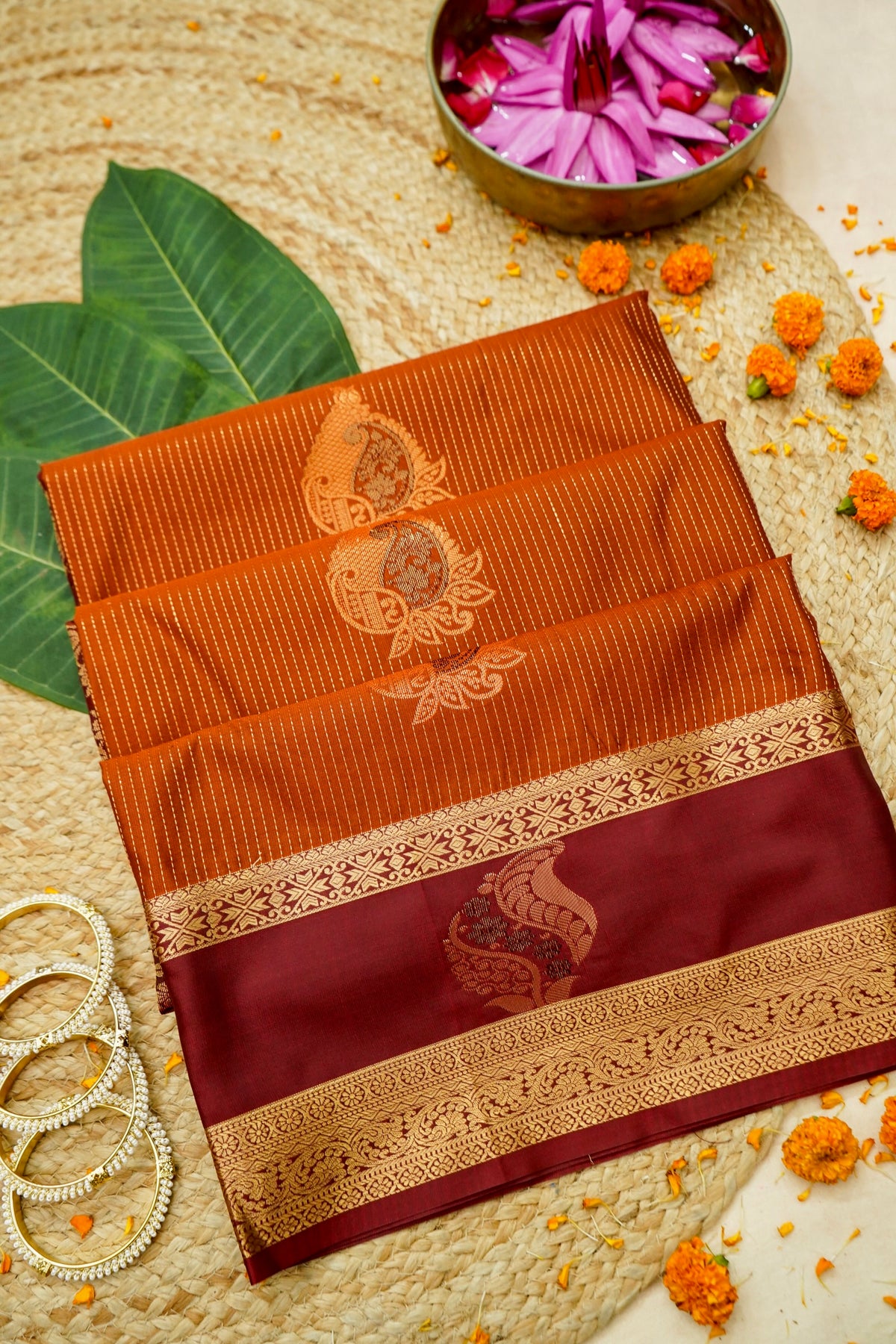 Devyani - Rust Orange Kanjivaram Silk Saree with Burgundy Korvai Border