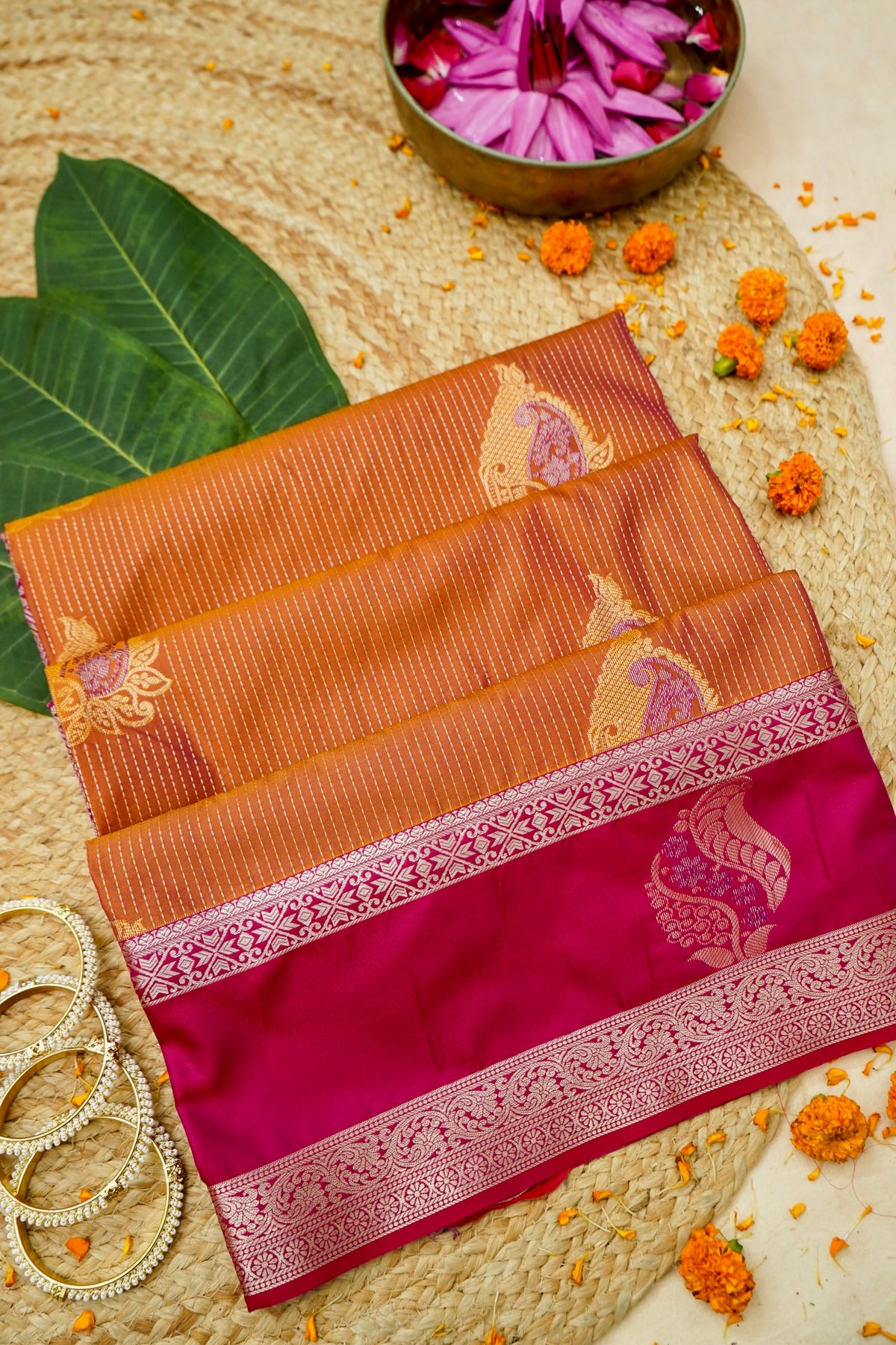 Devyani - Copper Orange Kanjivaram Silk Saree with Pink Korvai Border