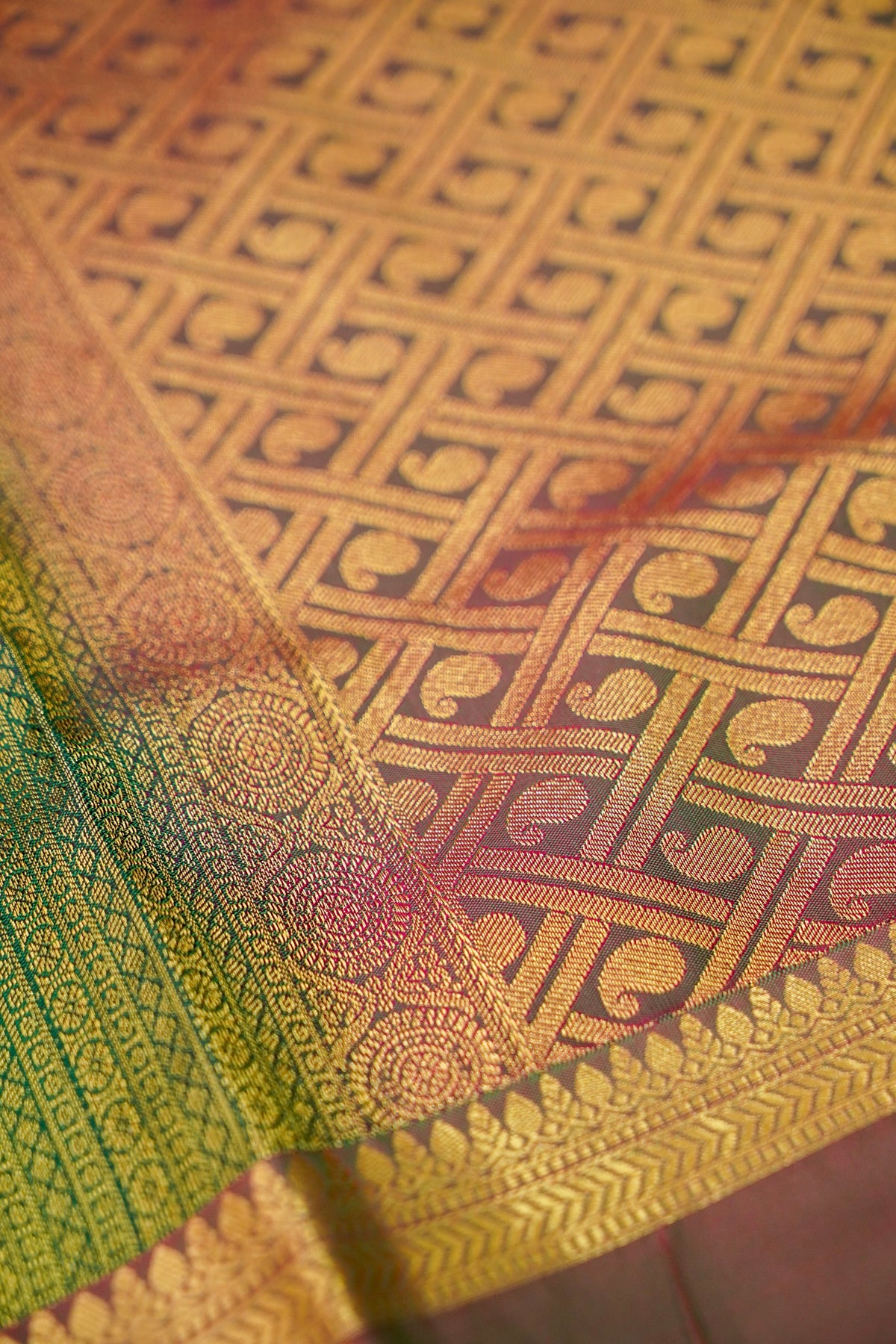 Devyani - Emerald Green Kanjivaram Silk Saree with Mauve Korvai Border