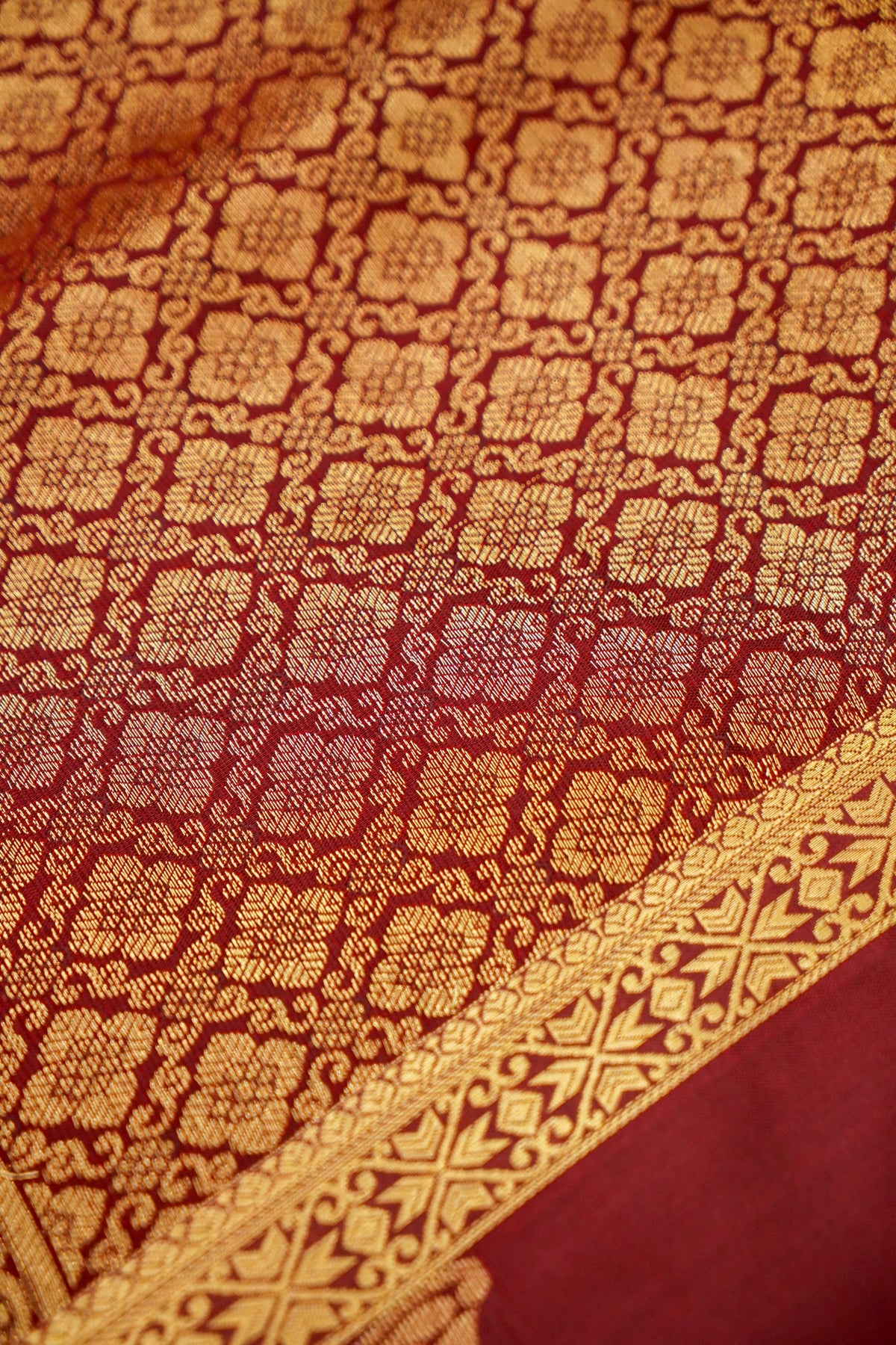 Devyani - Rust Orange Kanjivaram Silk Saree with Burgundy Korvai Border