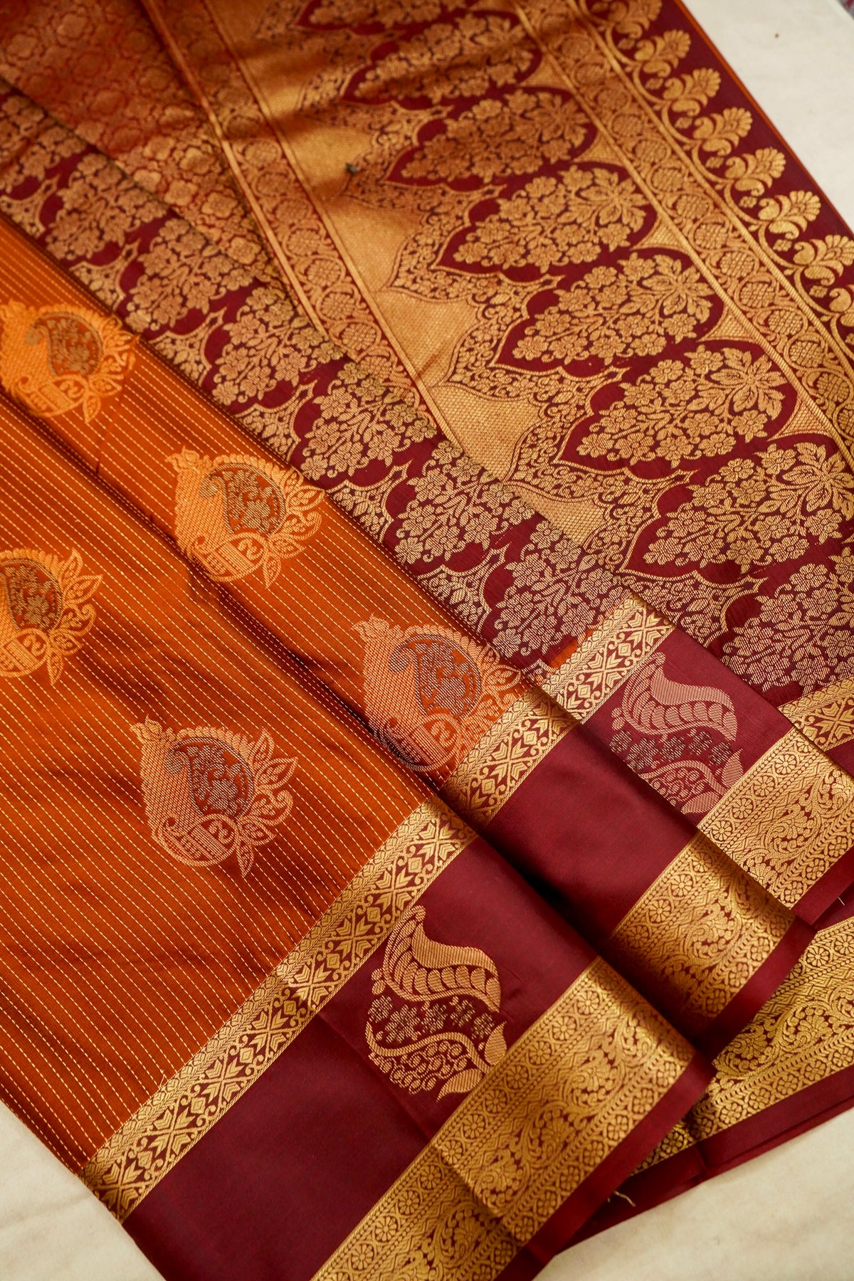 Devyani - Rust Orange Kanjivaram Silk Saree with Burgundy Korvai Border