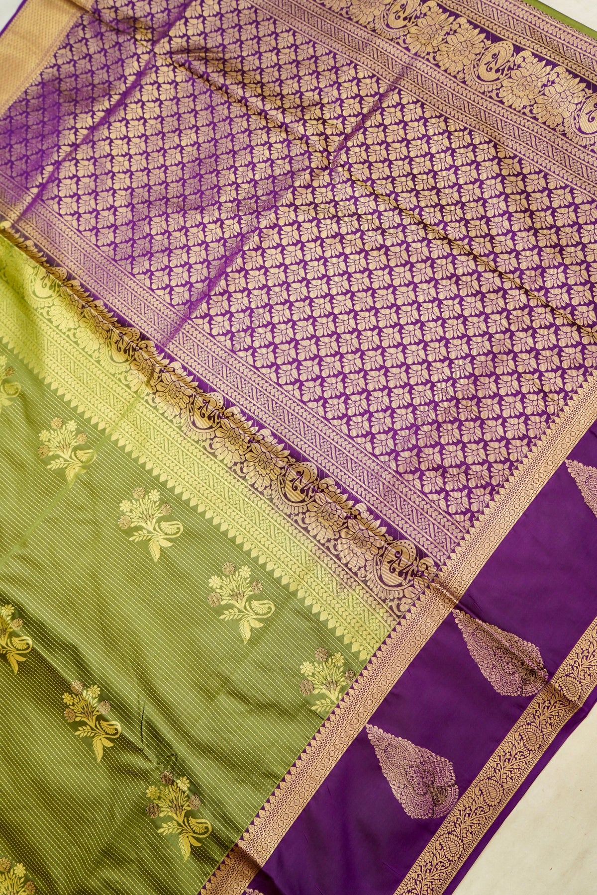 Devyani - Olive Green Kanjivaram Silk Saree with Purple Korvai Border