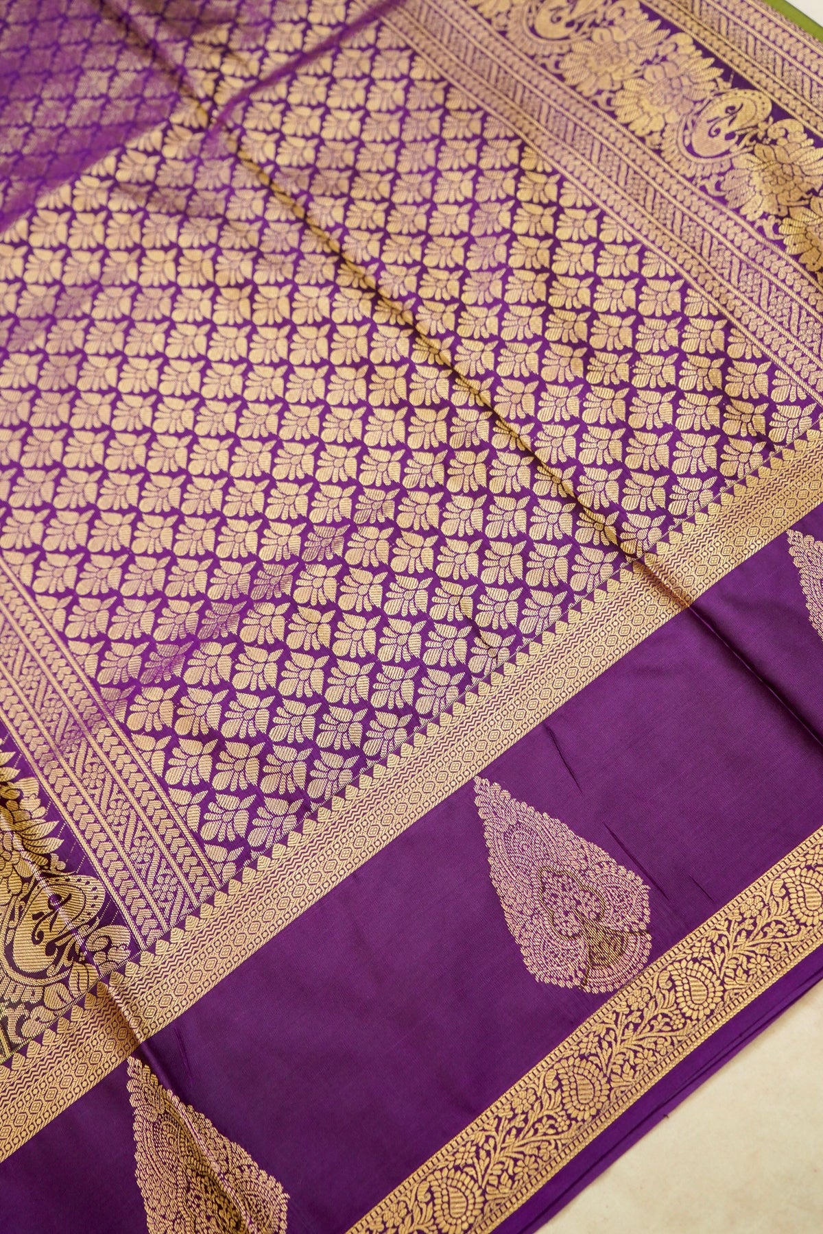 Devyani - Olive Green Kanjivaram Silk Saree with Purple Korvai Border