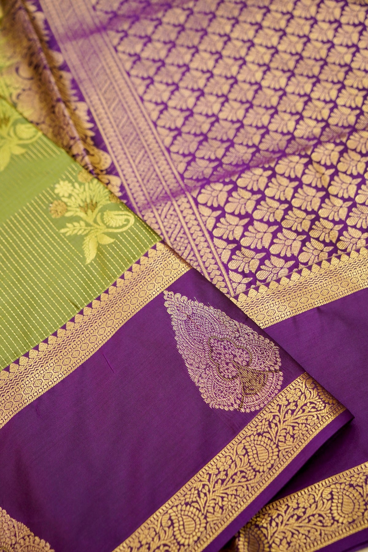 Devyani - Olive Green Kanjivaram Silk Saree with Purple Korvai Border