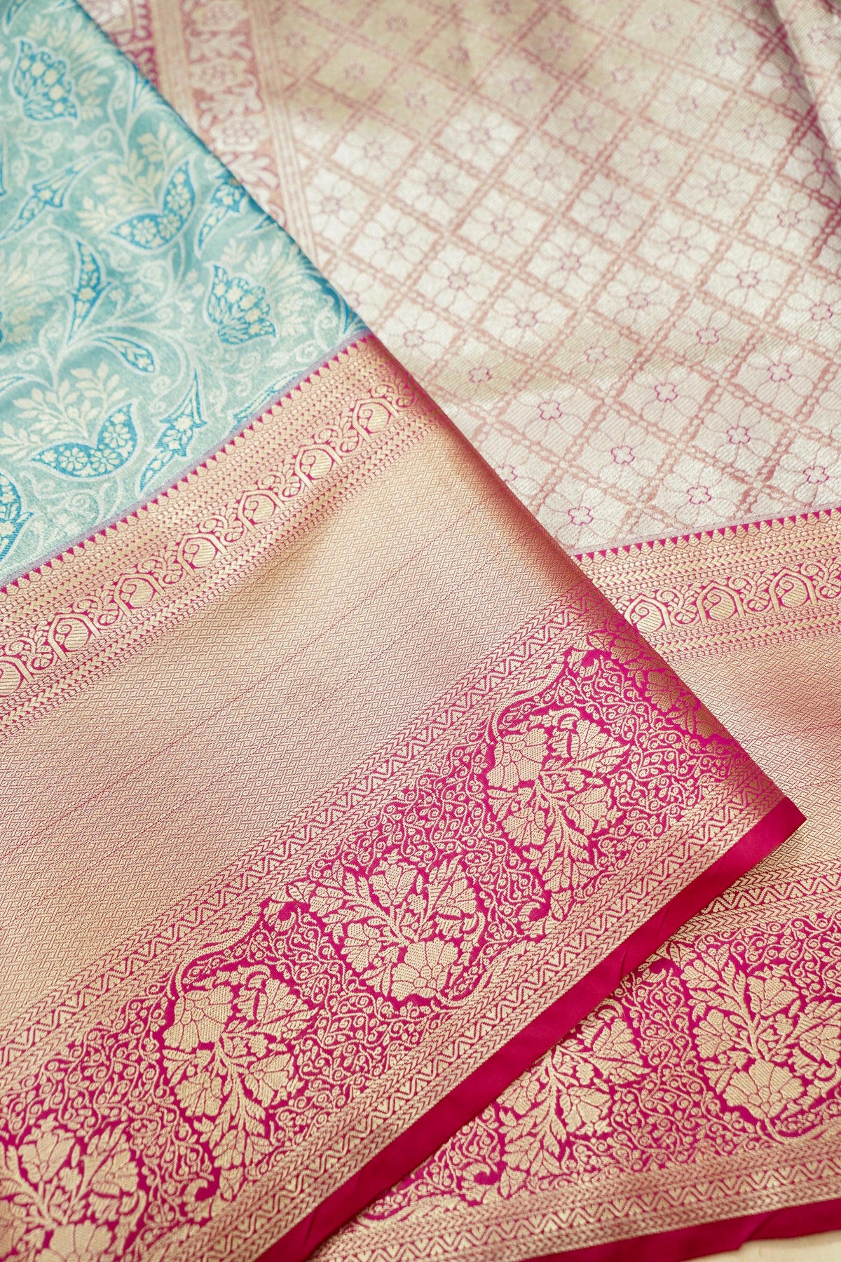 Devyani - Aqua Blue Kanchi Pattu Silk Saree with Rani Pink Korvai Border
