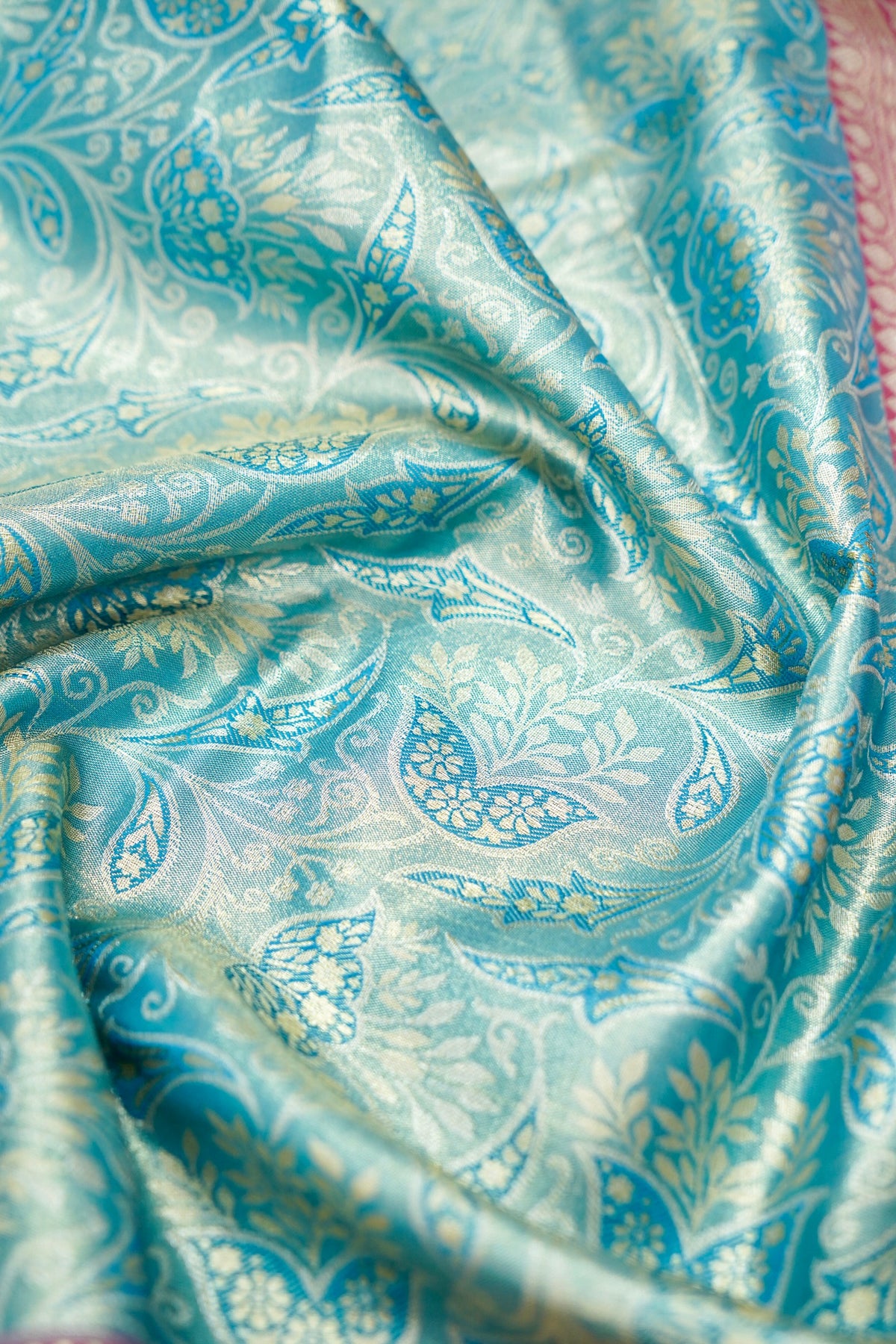 Devyani - Aqua Blue Kanchi Pattu Silk Saree with Rani Pink Korvai Border