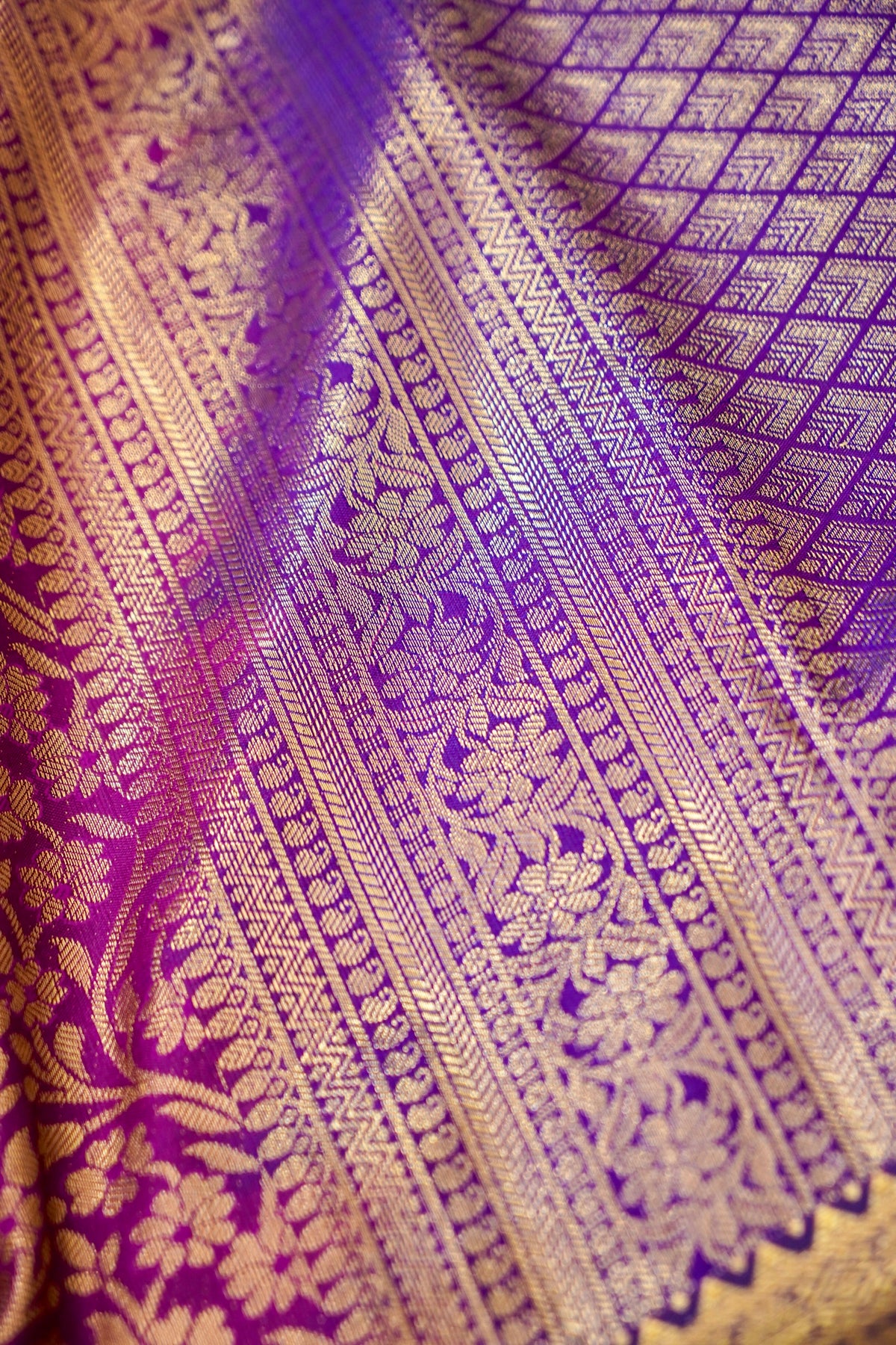 Devyani - Magenta Purple Kanchi Pattu Silk Saree with Gold Border