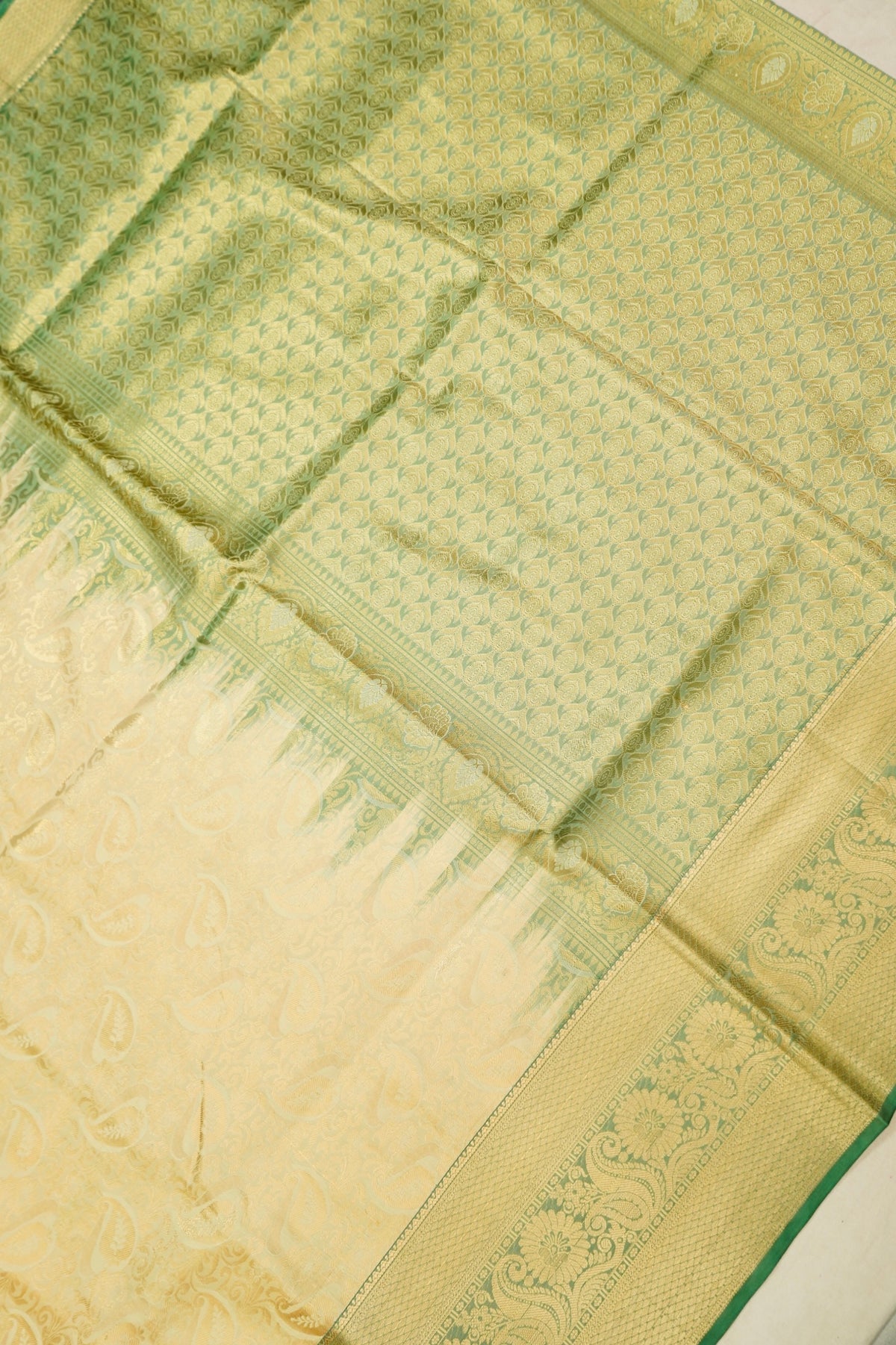 Devyani - Pastel Yellow Kanchi Pattu Silk Saree with Green Border