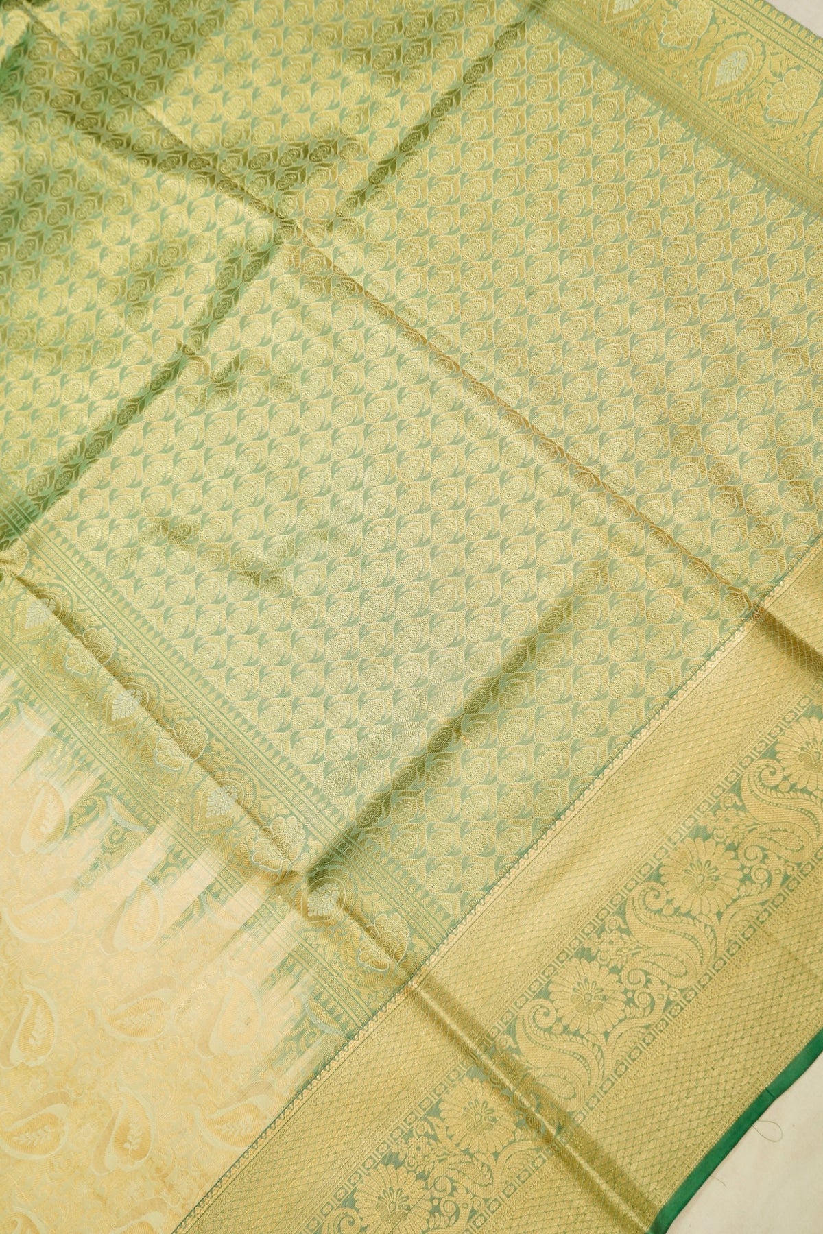 Devyani - Pastel Yellow Kanchi Pattu Silk Saree with Green Border
