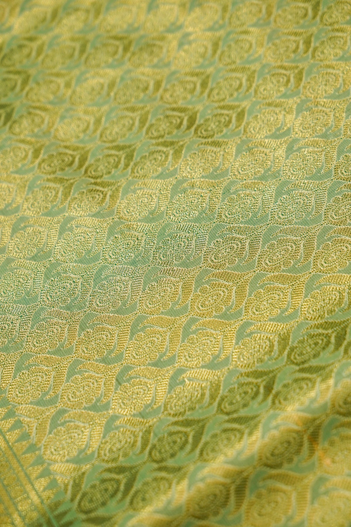 Devyani - Pastel Yellow Kanchi Pattu Silk Saree with Green Border