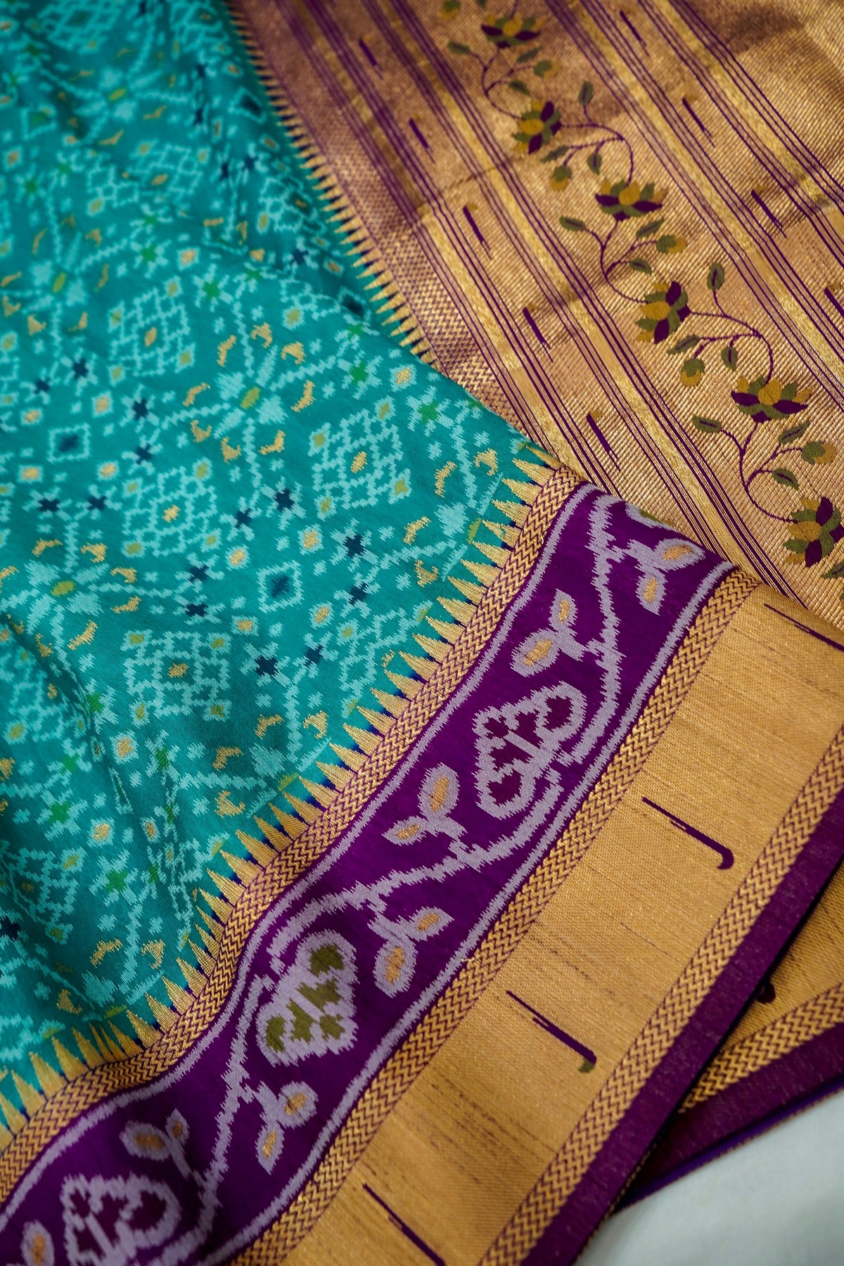 Turquoise Dupion Silk Patola Saree with Contrast Purple Border