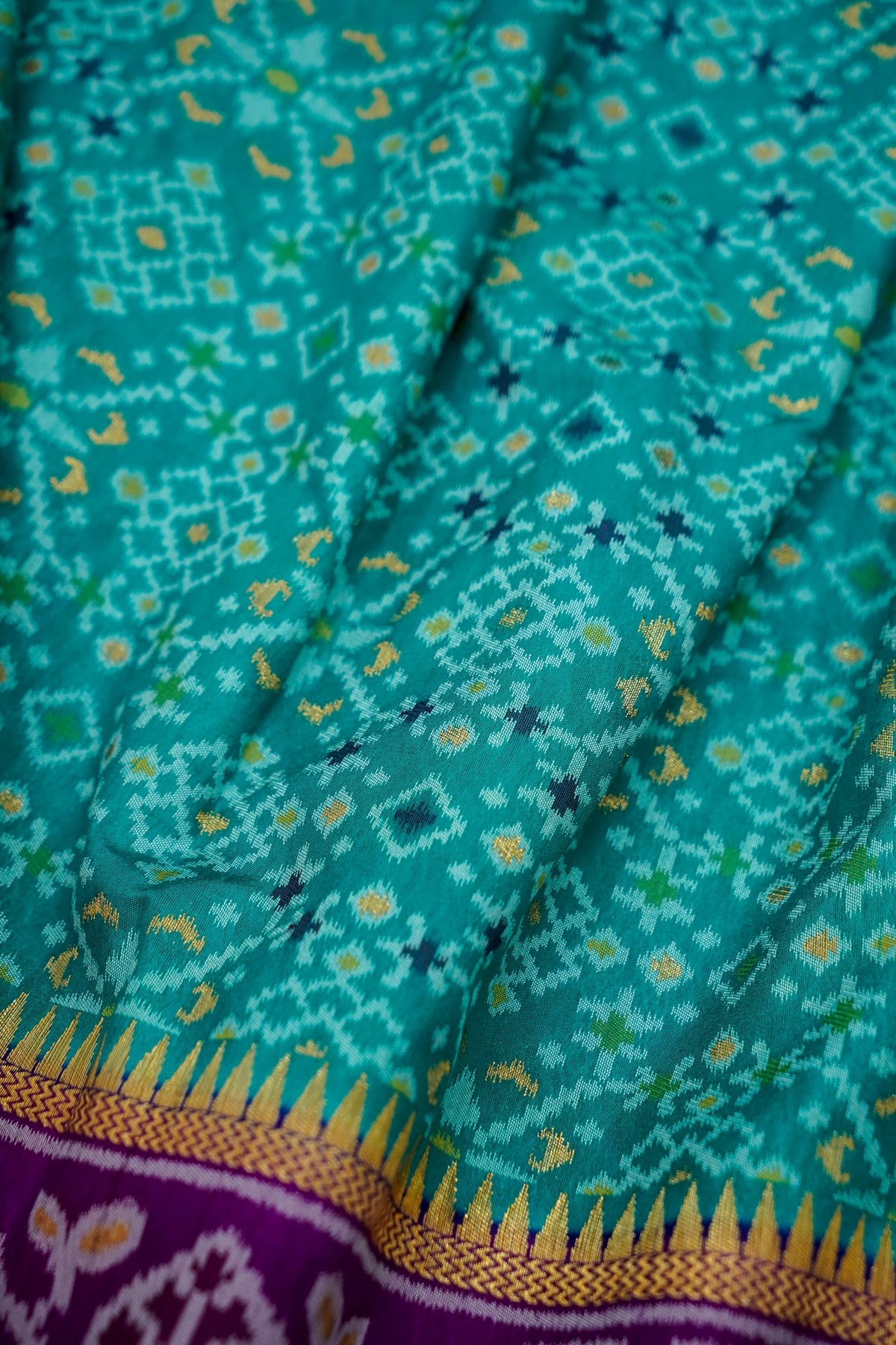 Turquoise Dupion Silk Patola Saree with Contrast Purple Border