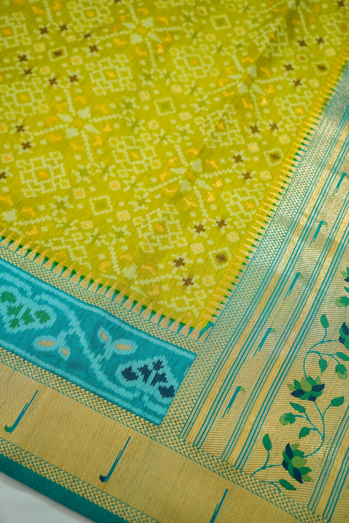 Lime Dupion Silk Patola Saree with Contrast Turquoise Border