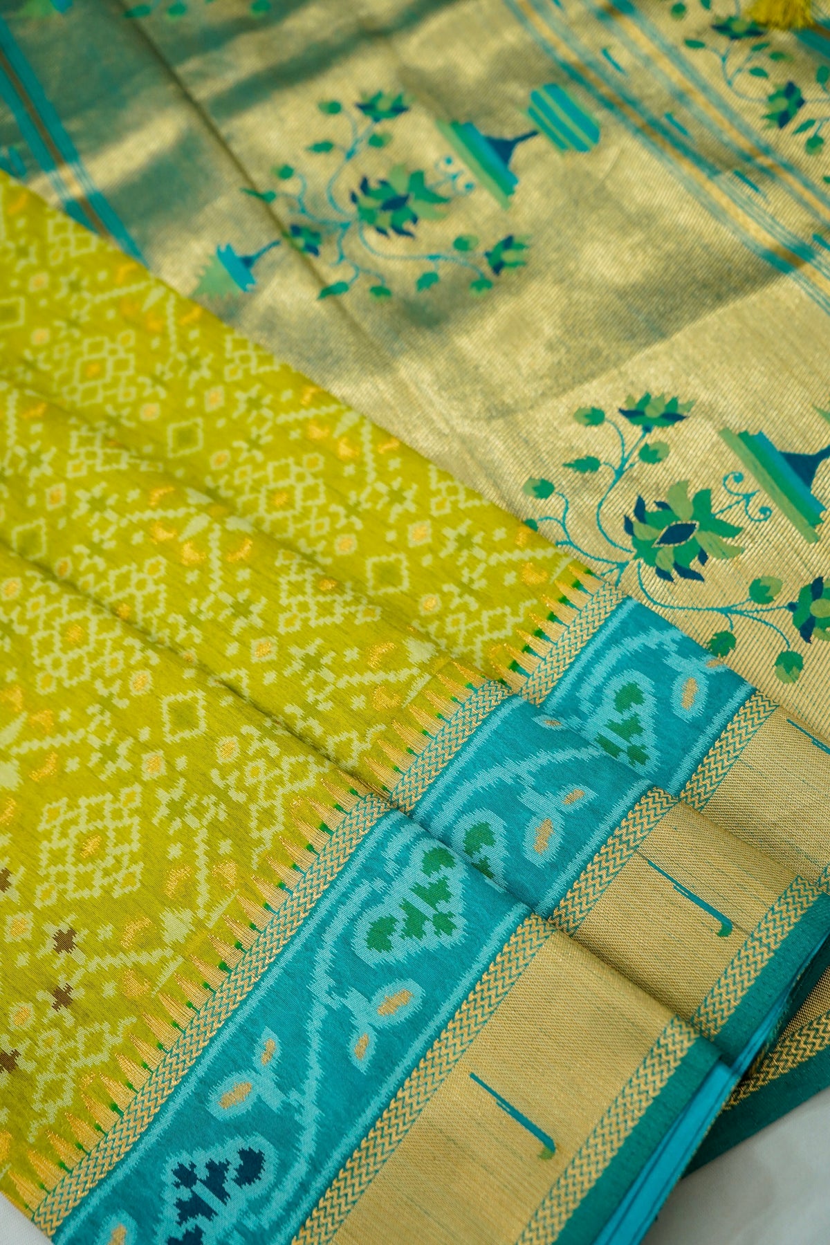 Lime Dupion Silk Patola Saree with Contrast Turquoise Border