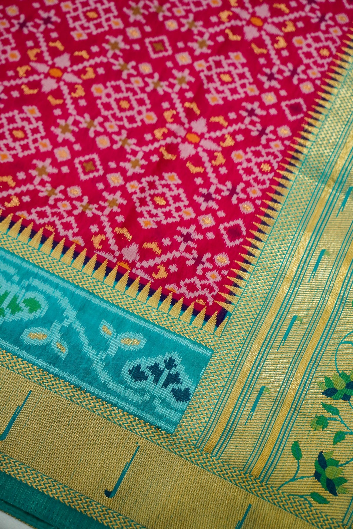 Raspberry Pink Dupion Silk Patola Saree with Contrast Turquoise Border