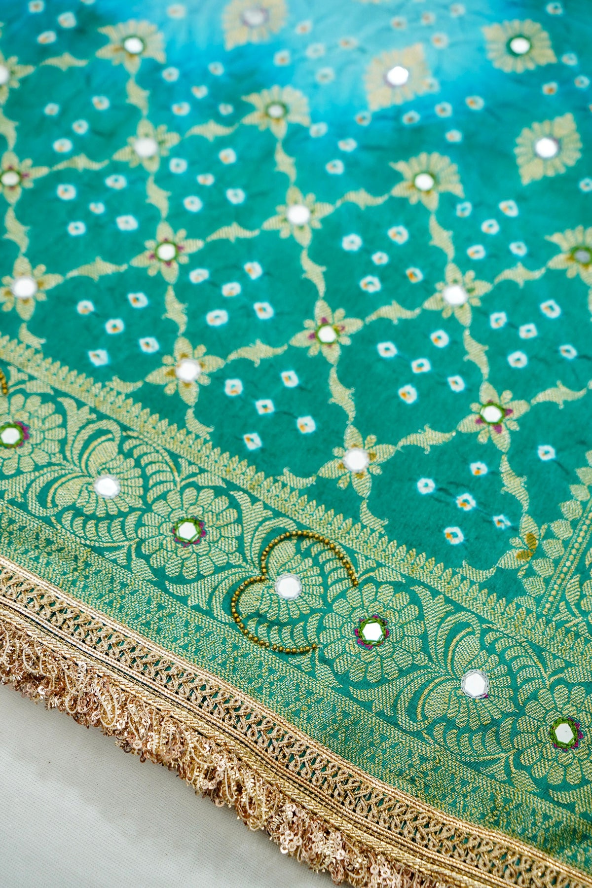 Dual-Tone Paisley Motif Sky Blue and Teal Green Bandhani Dupion Silk Saree