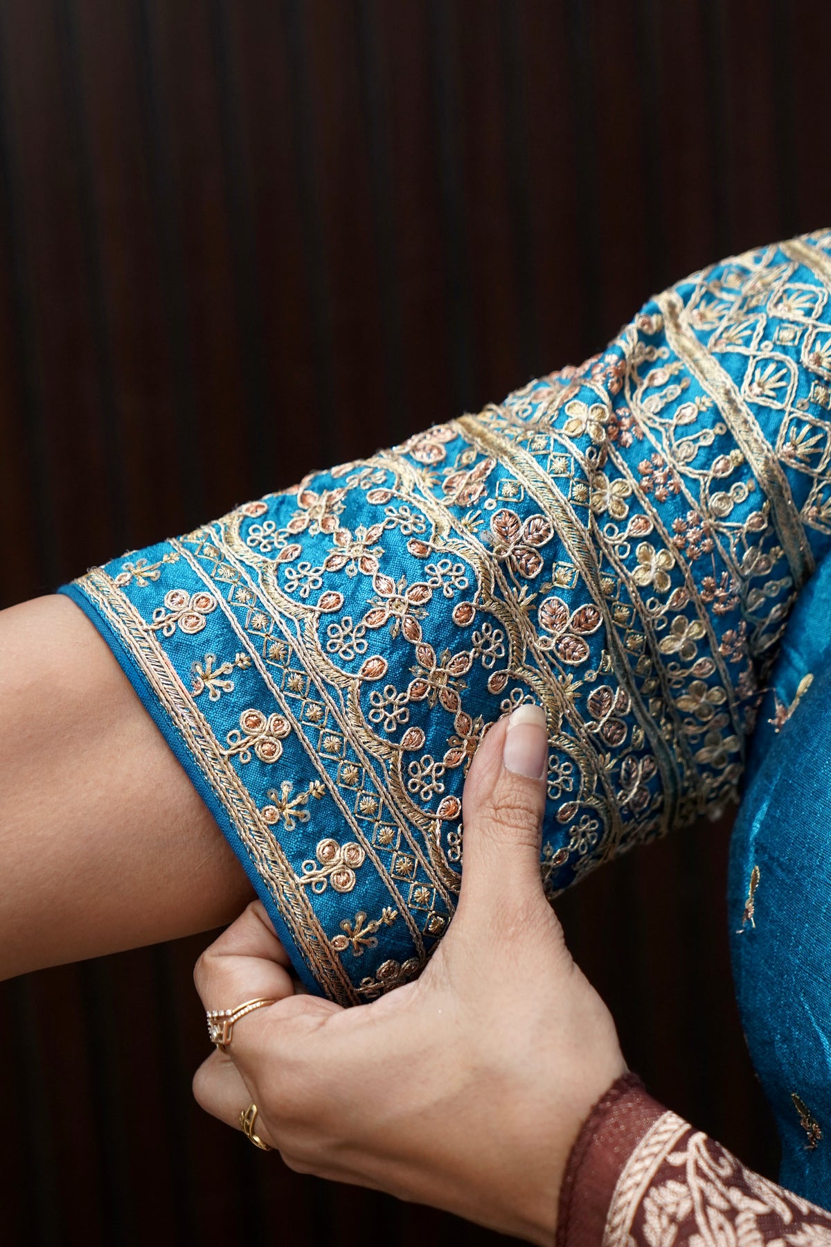 Bright Turquoise Blue Blouse with Heavy Embroidery Sleeve Work