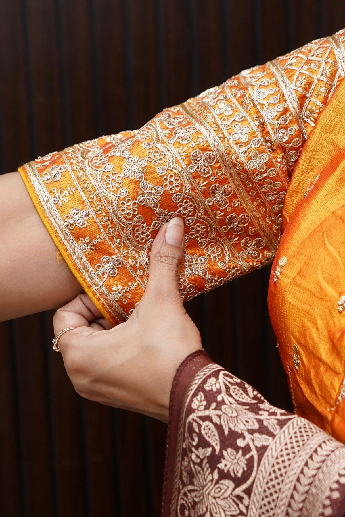 Orange Blouse with Heavy Embroidery Sleeve Work