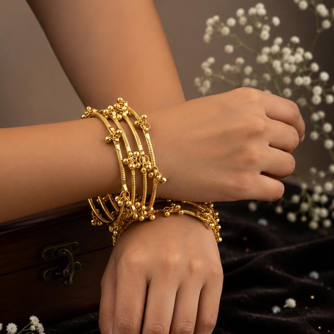 Pair of Golden Textured Ghungroo Charm Bangles