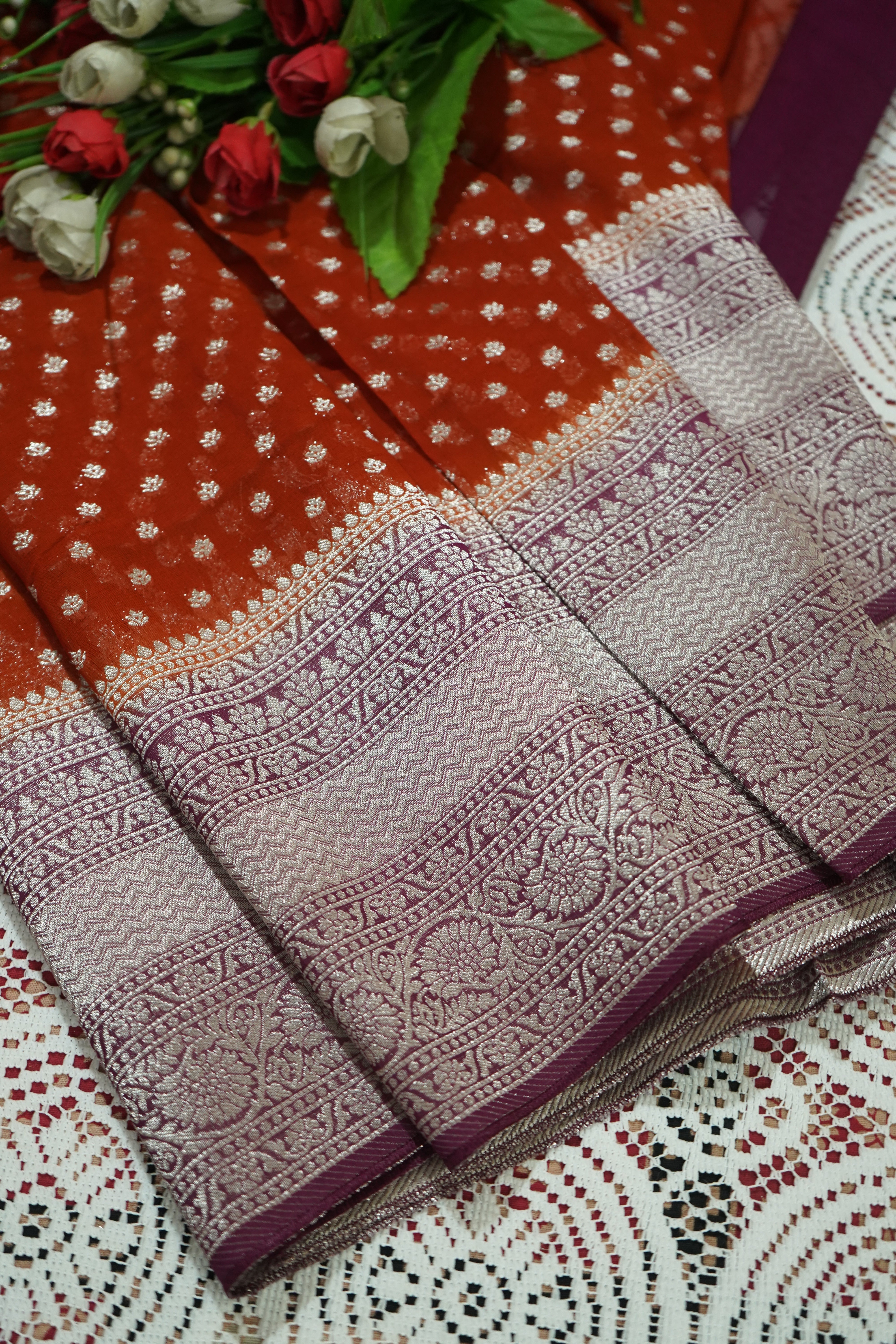 Burnt Orange Khaddi Georgette Pure Banarasi Saree with Contrast Mauve Grey Border