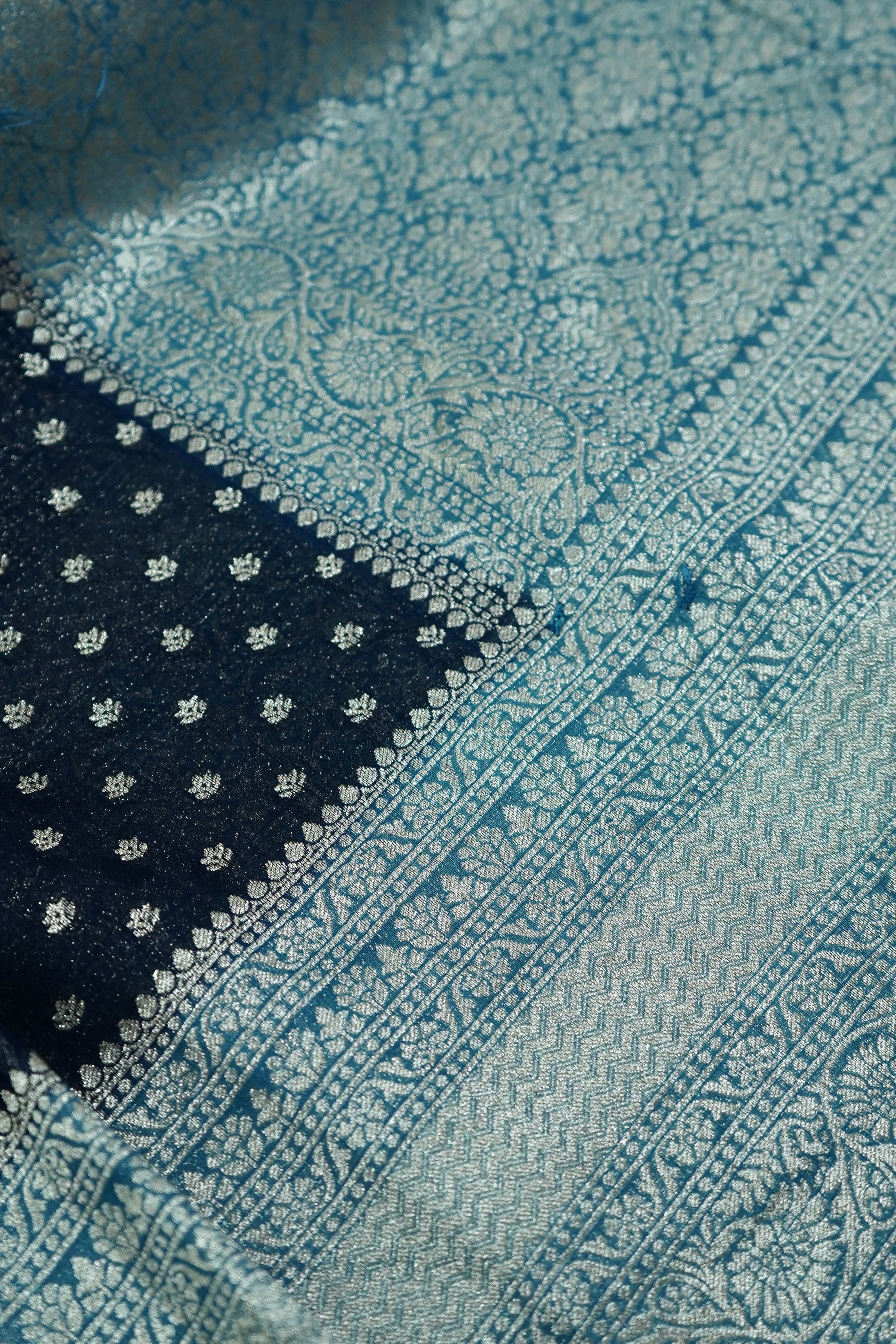 Navy Blue Khaddi Georgette Pure Banarasi Saree with Icy Blue and Champagne Zari Border