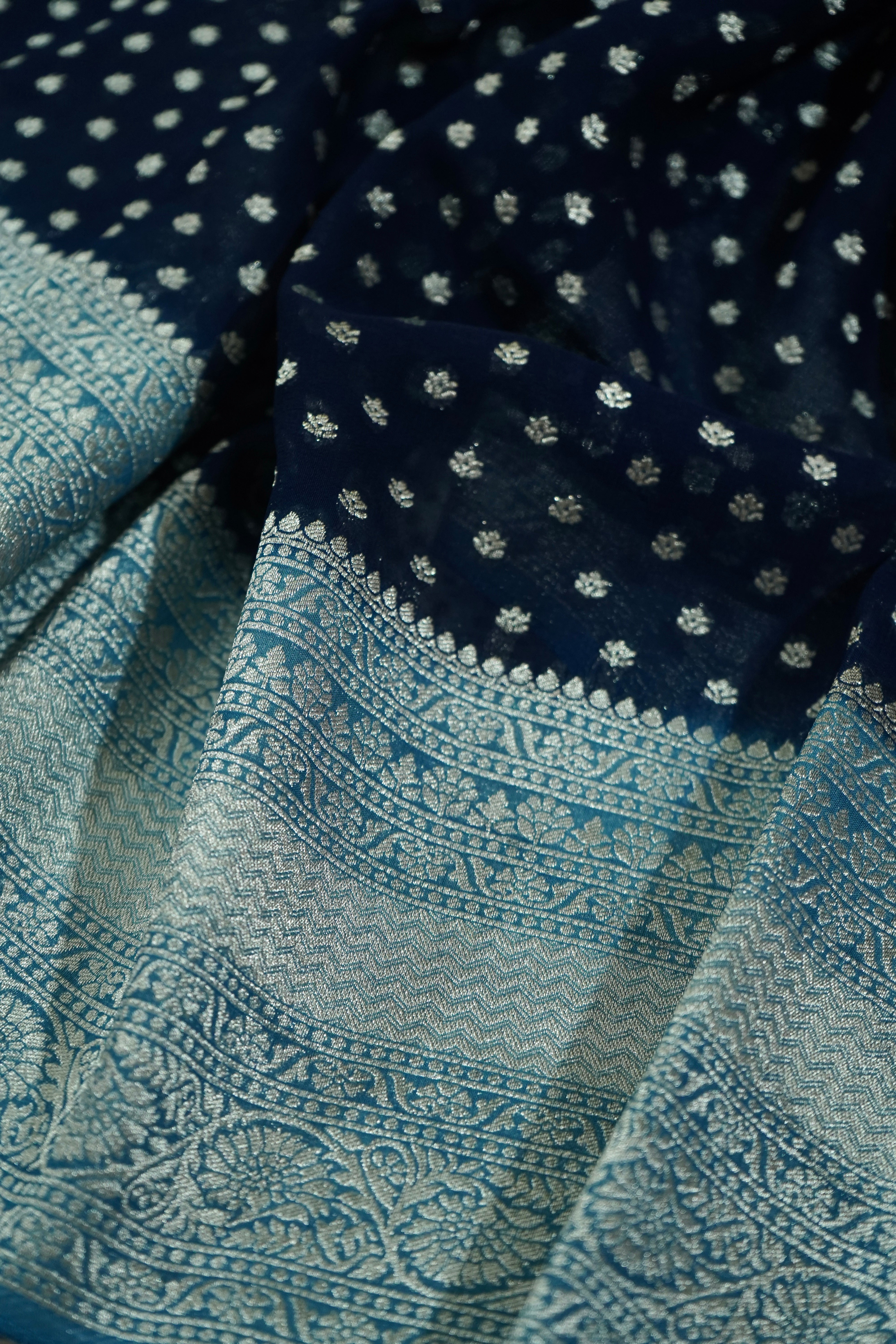 Navy Blue Khaddi Georgette Pure Banarasi Saree with Icy Blue and Champagne Zari Border