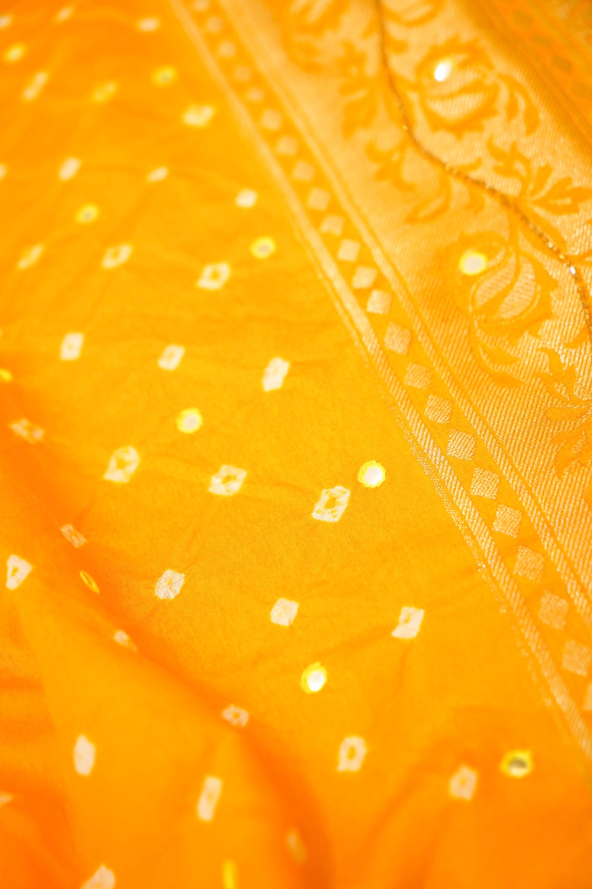Marigold Yellow Bandhani Saree with Floral Mirror and Fringe Border