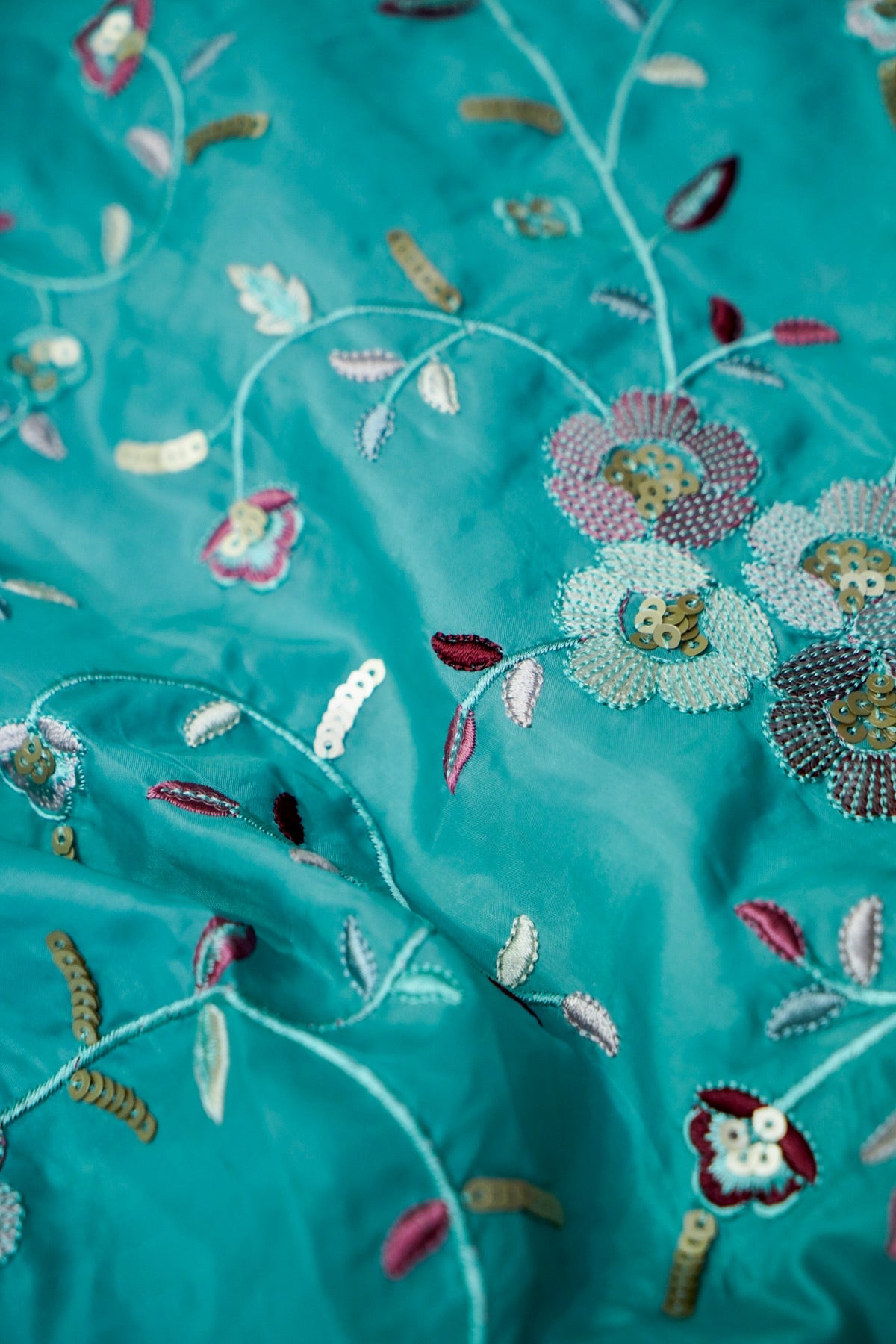 Aqua Blue Embroidered Designer Tissue Saree with Daisy Scalloped Border