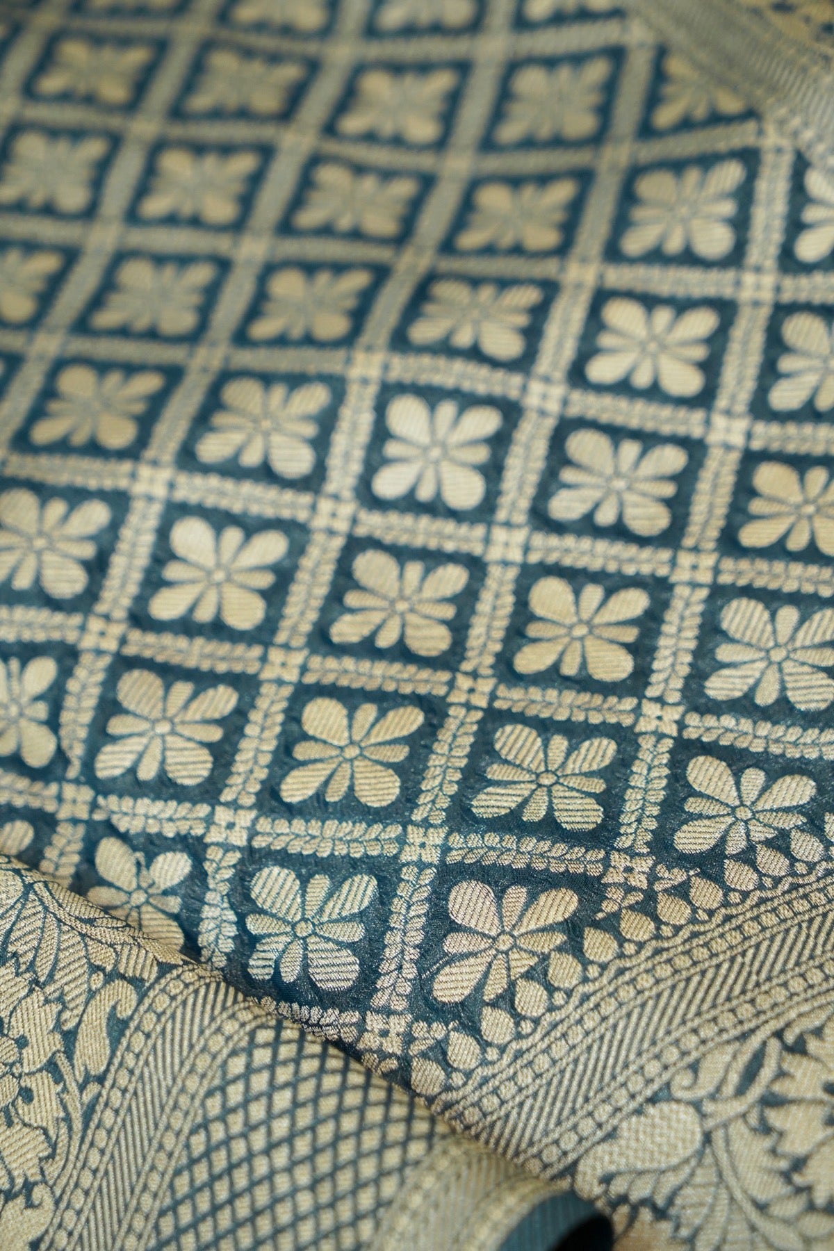 Deep Teal Blue Khaddi Georgette Pure Banarasi Saree with Champagne Zari Border